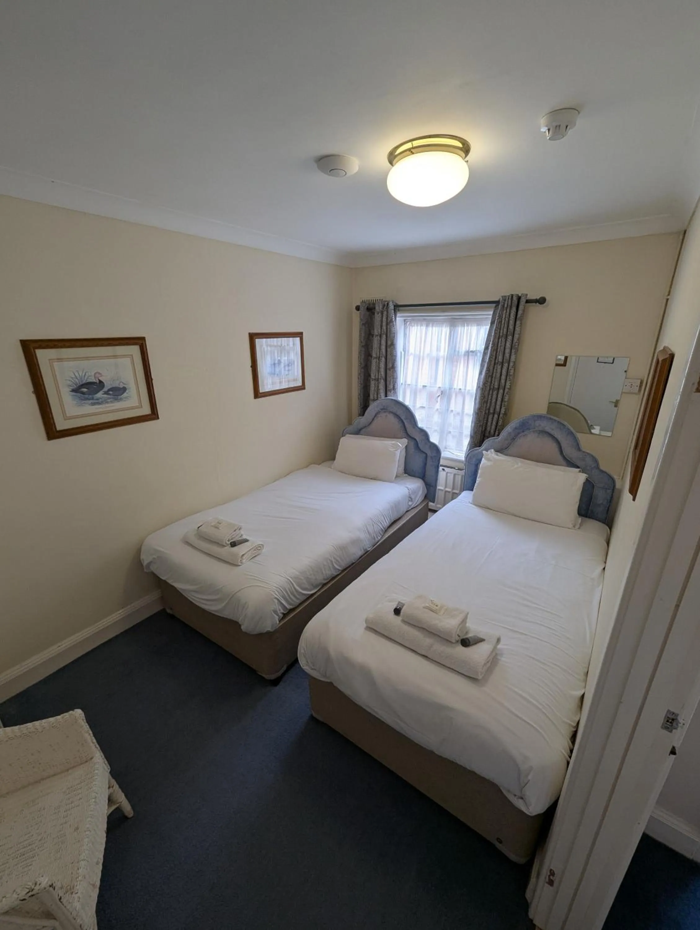 Bed in The Walnut Tree Hotel