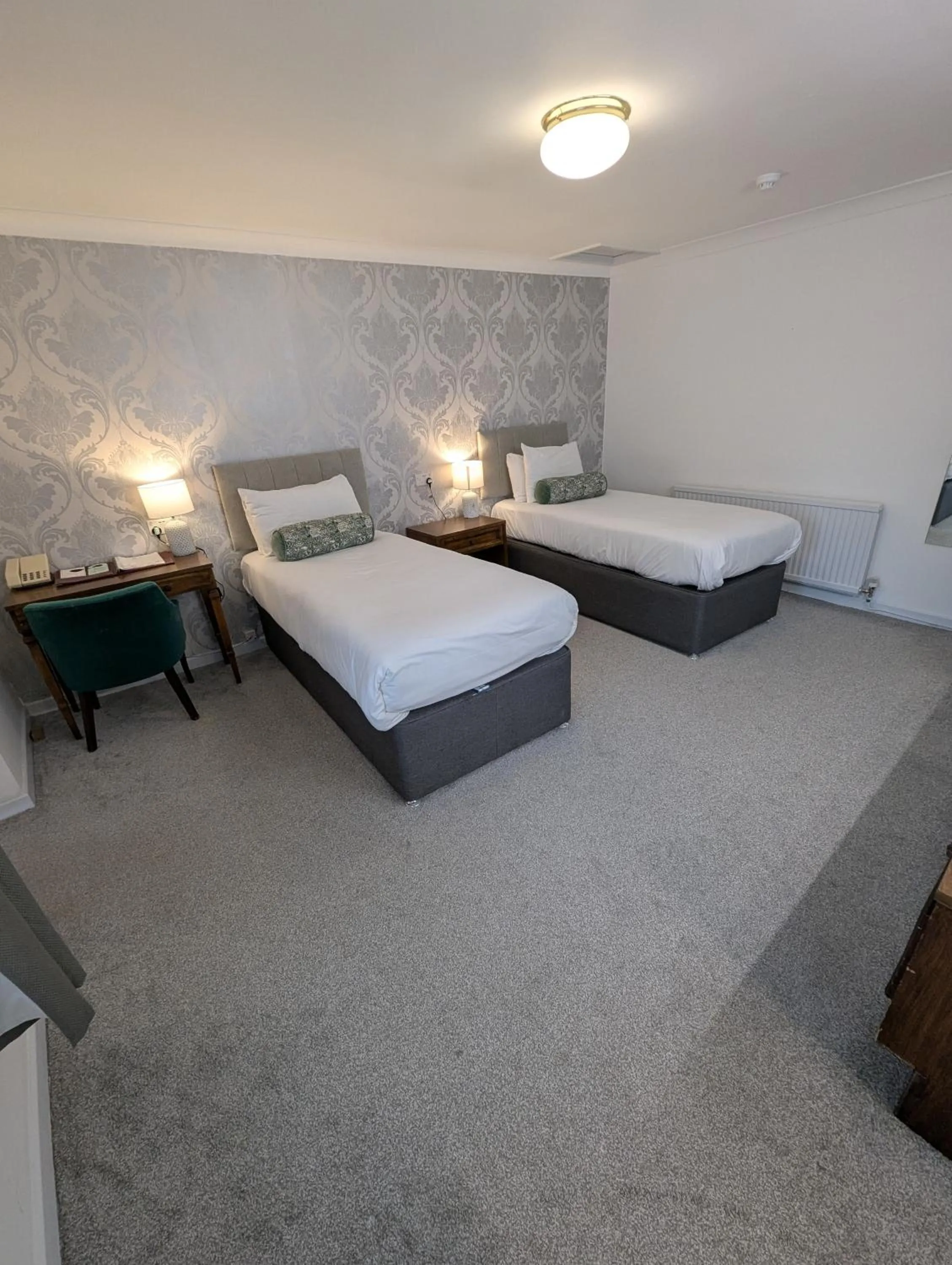 Bed in The Walnut Tree Hotel