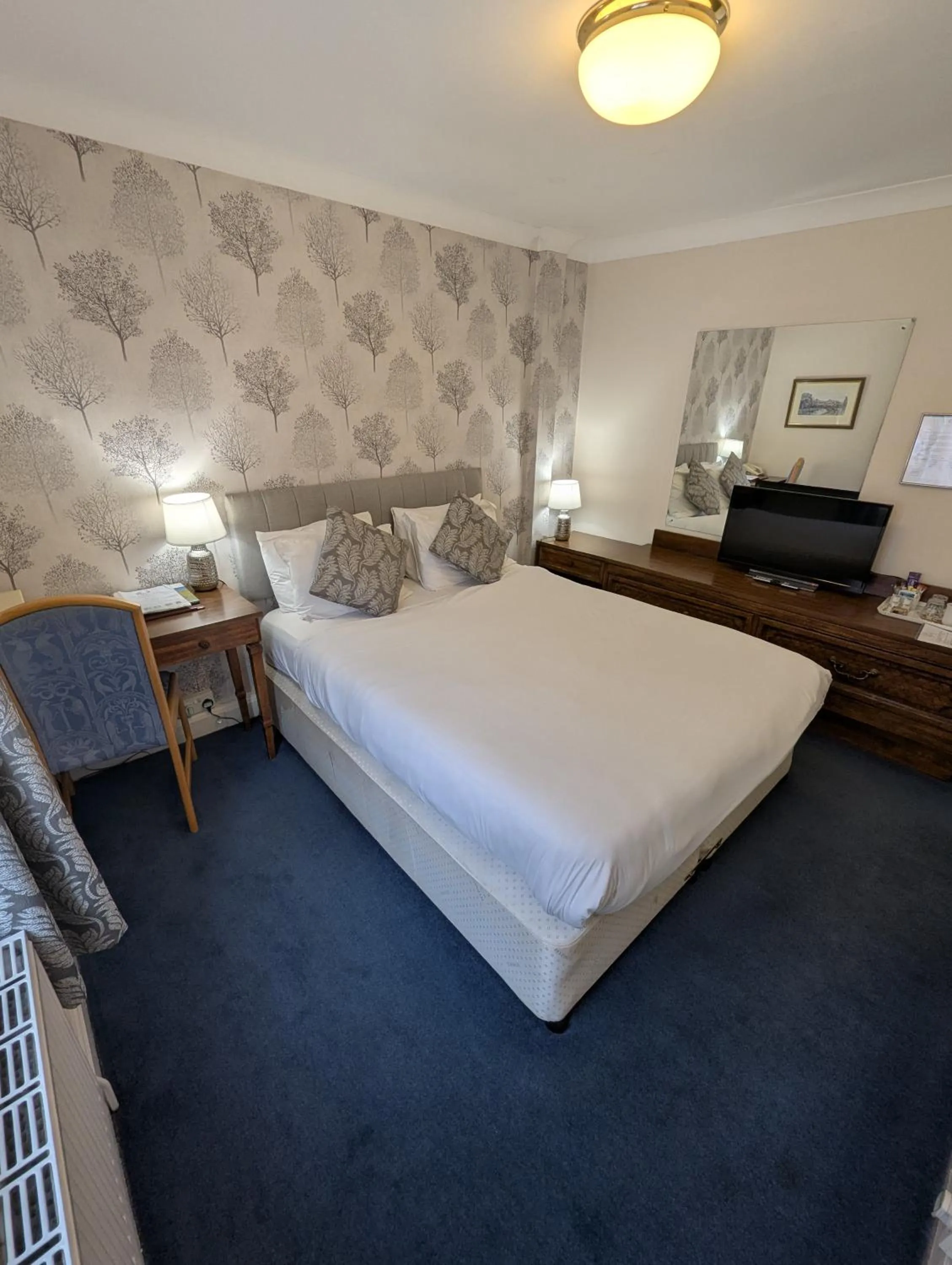 Bed in The Walnut Tree Hotel