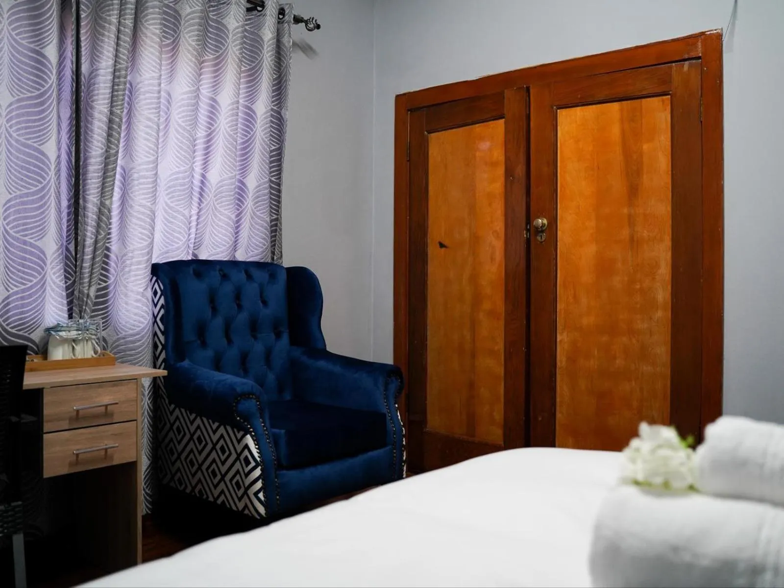 Seating area, Bed in Aqua Guest House