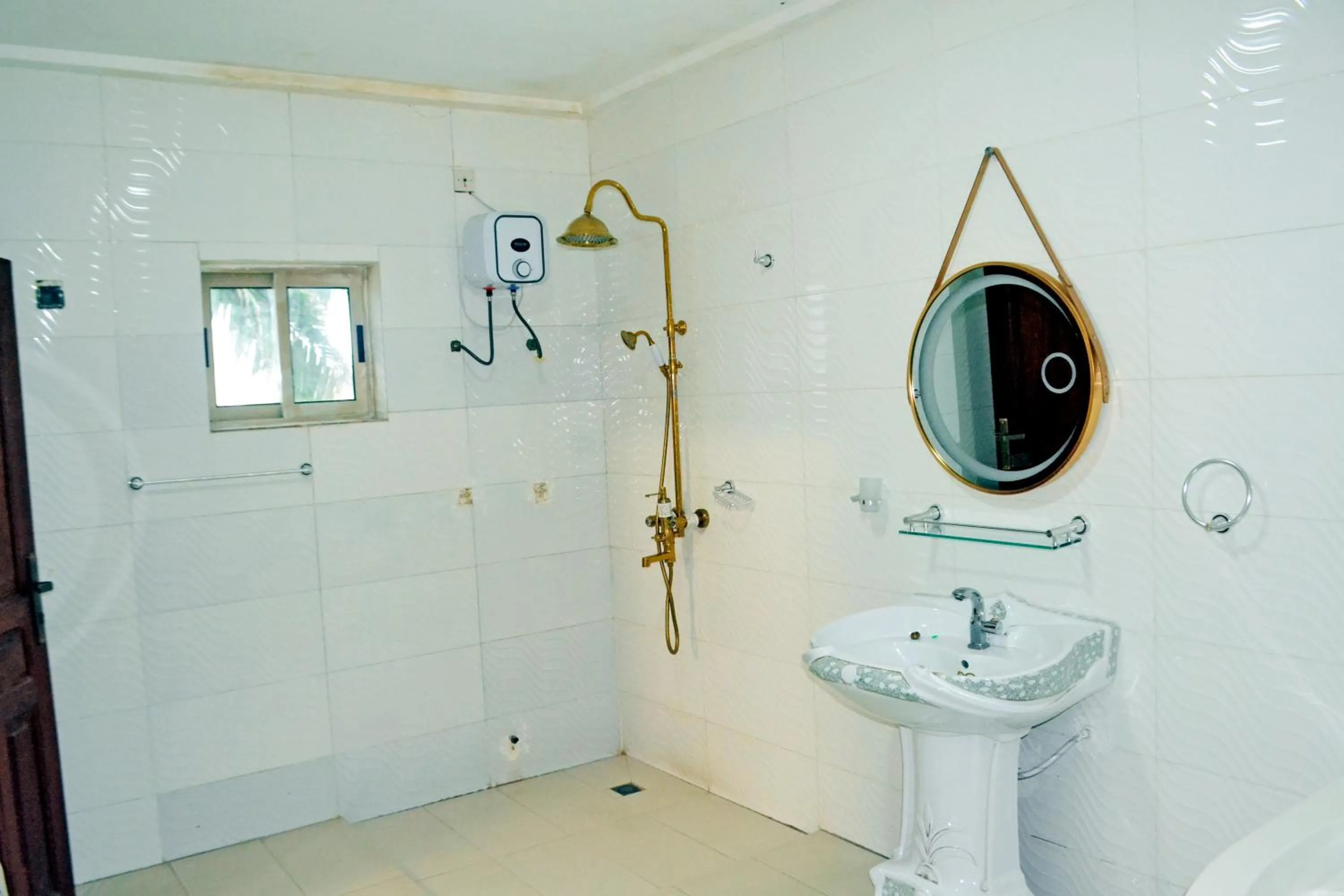 Shower in Beach Sand Hotel & Resort, Cotonou