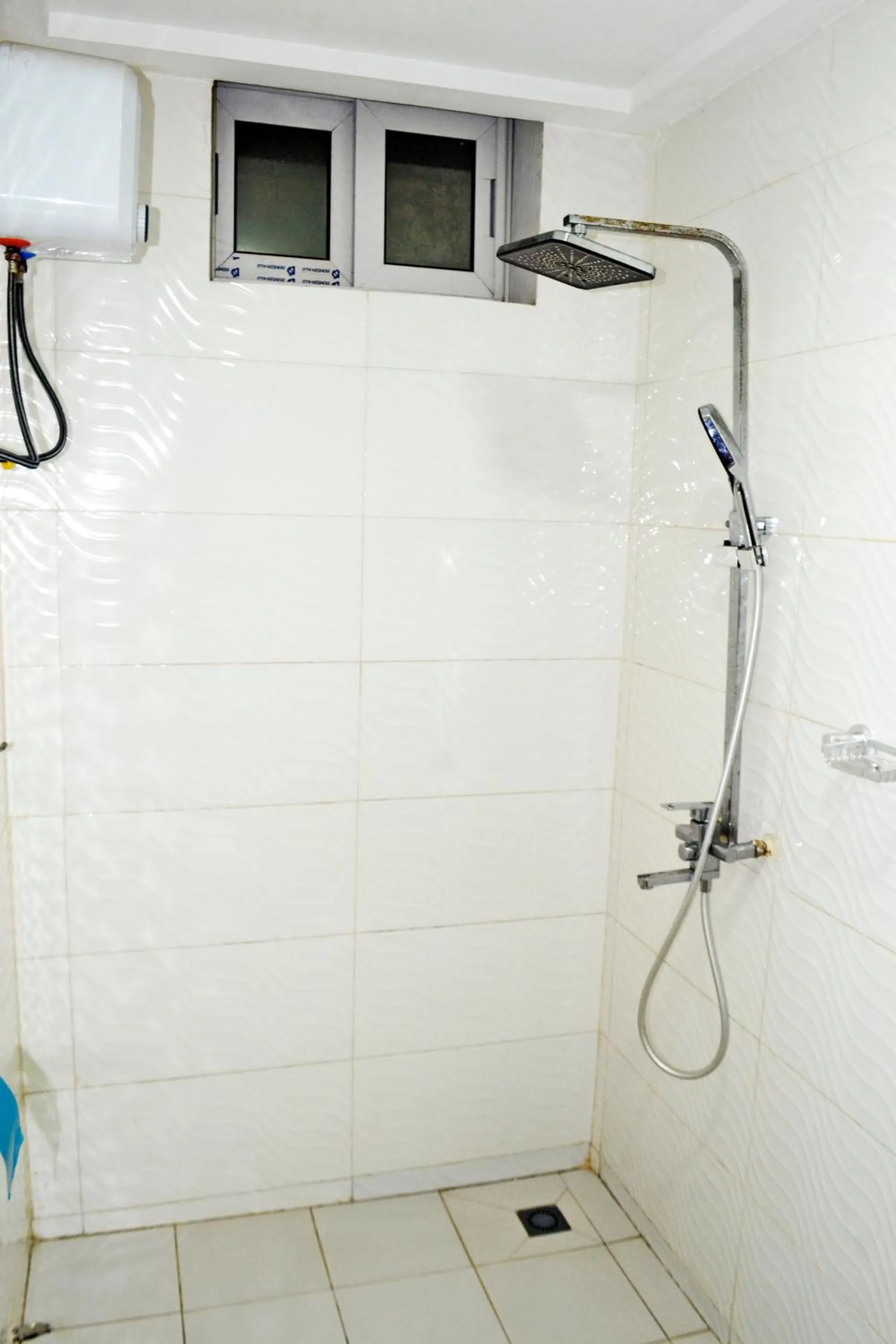 Shower in Beach Sand Hotel & Resort, Cotonou