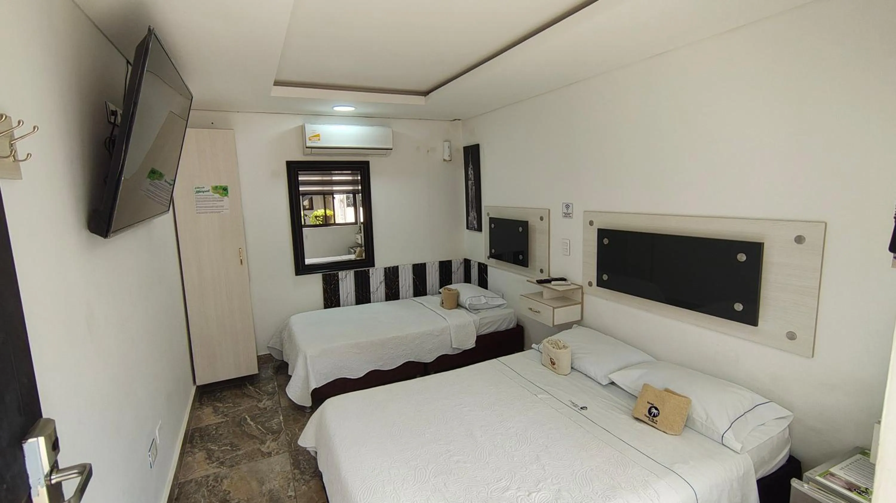 Bed in Hotel deluxe oasis de la colina boutique