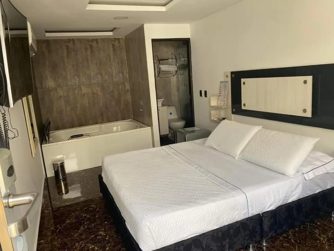 Bed in Hotel deluxe oasis de la colina boutique