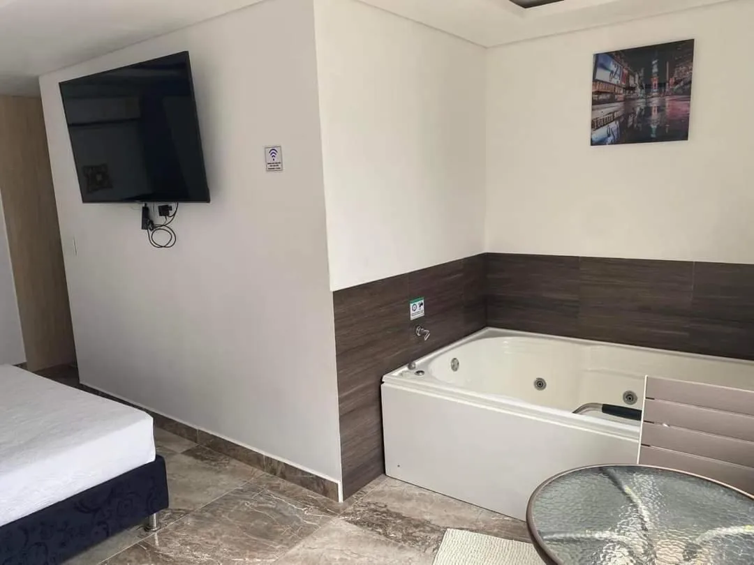 Bed in Hotel deluxe oasis de la colina boutique