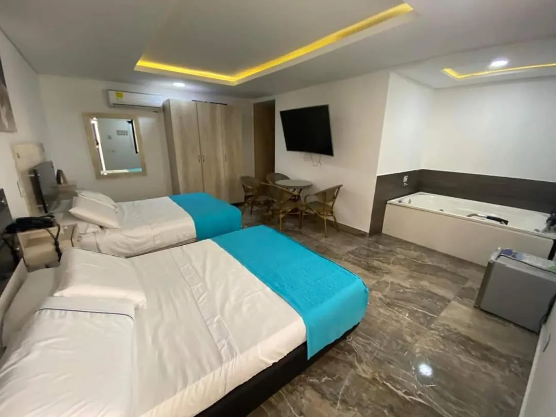 Communal lounge/ TV room, Bed in Hotel deluxe oasis de la colina boutique