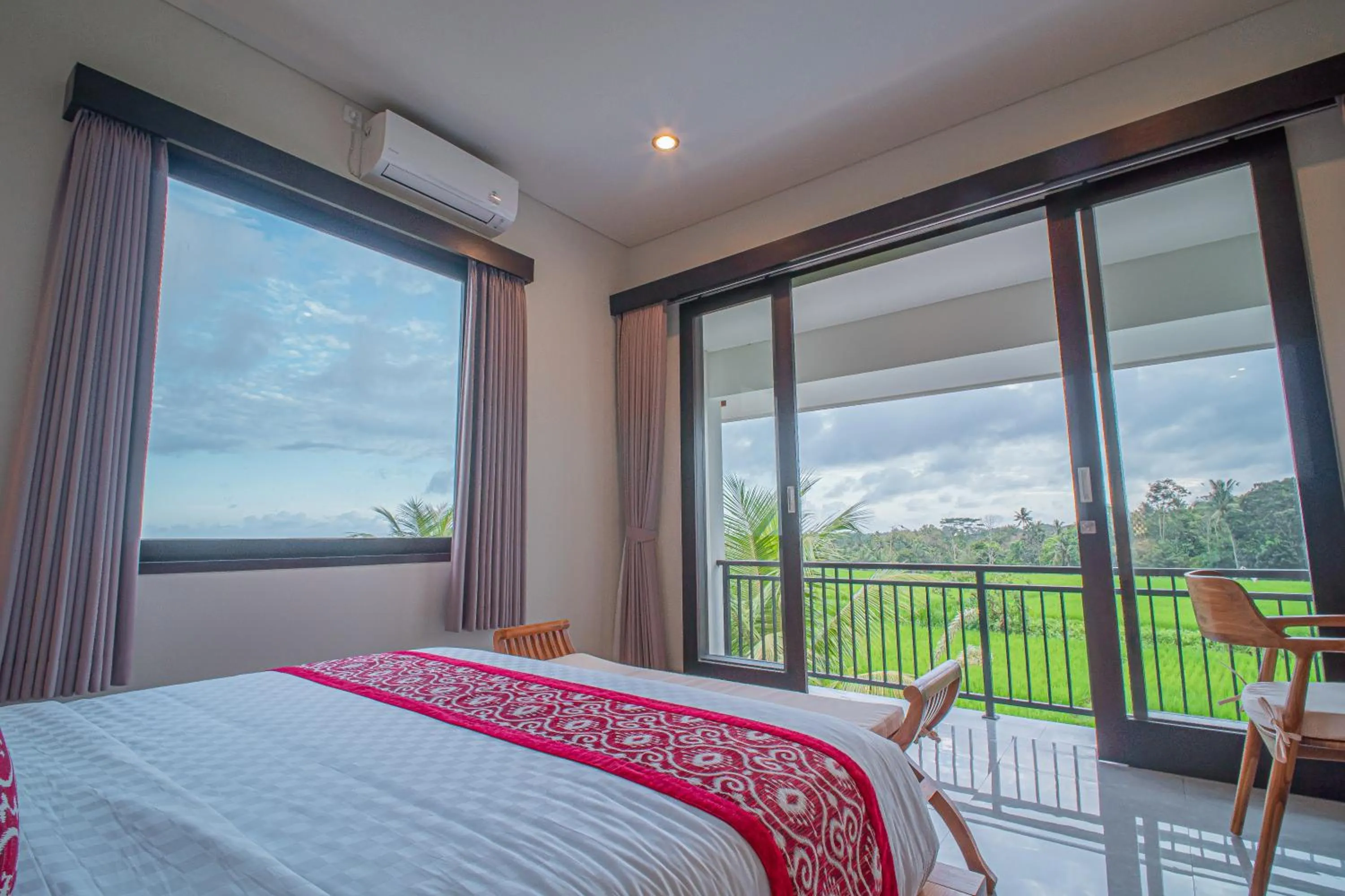 Bed in Mahadewi Sunset Villa