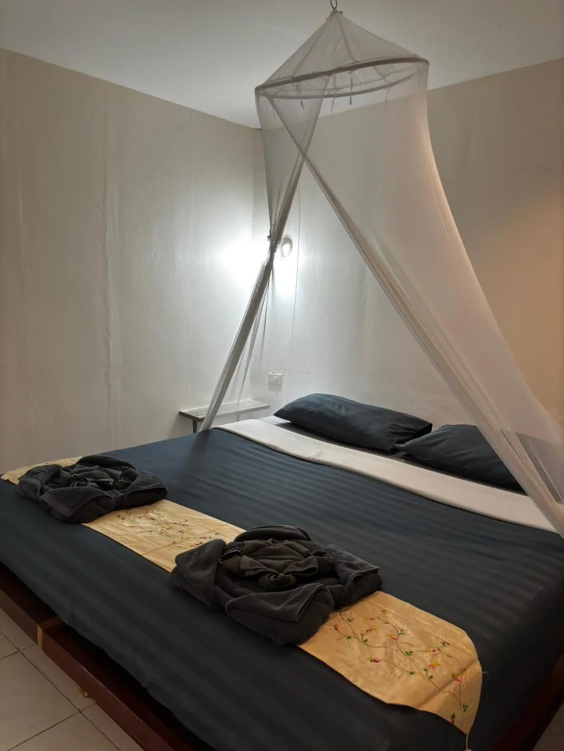 Bed in Khao Sok Jungle Huts Resort