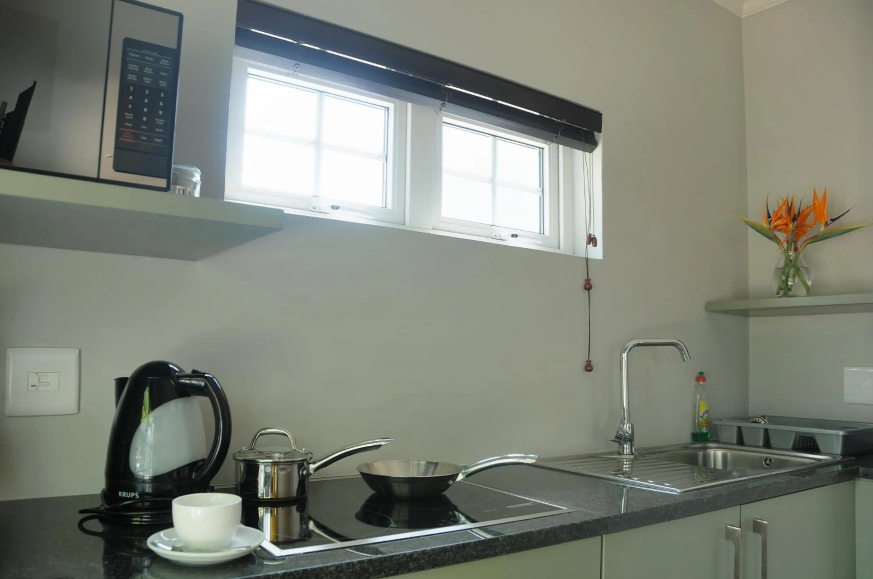 Kitchen or kitchenette in ilanda Guest House