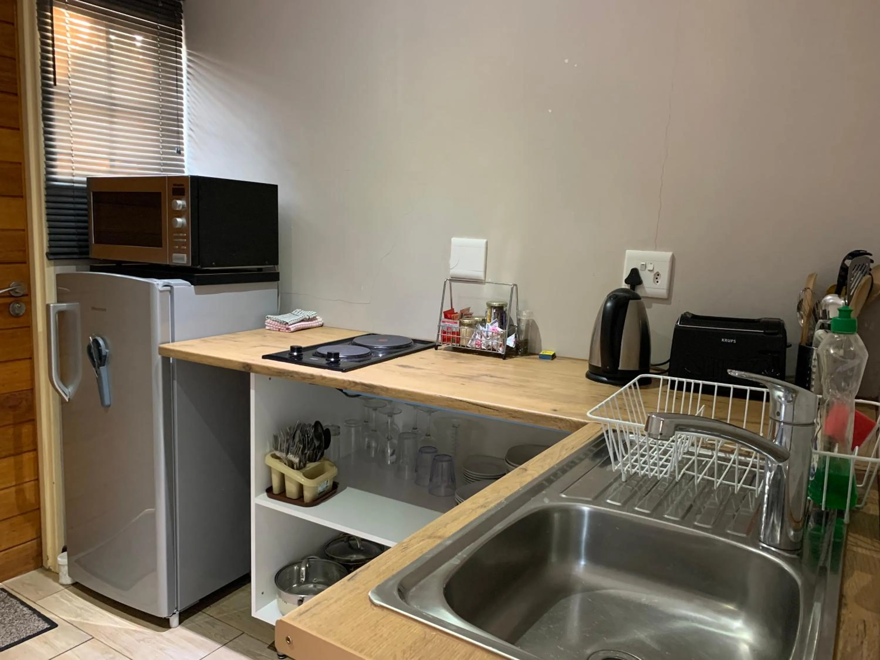 Kitchen or kitchenette in ilanda Guest House