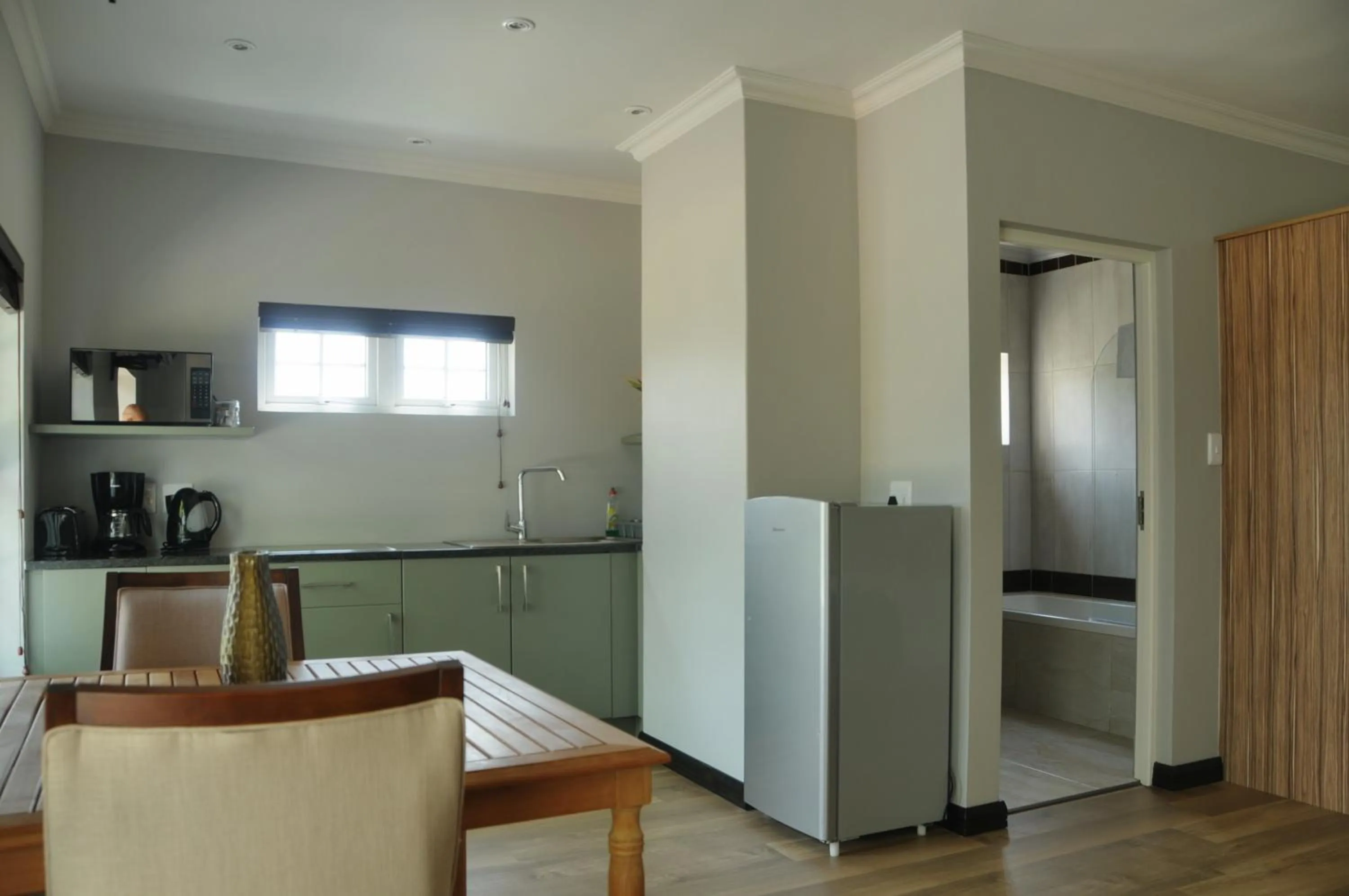 Kitchen or kitchenette in ilanda Guest House