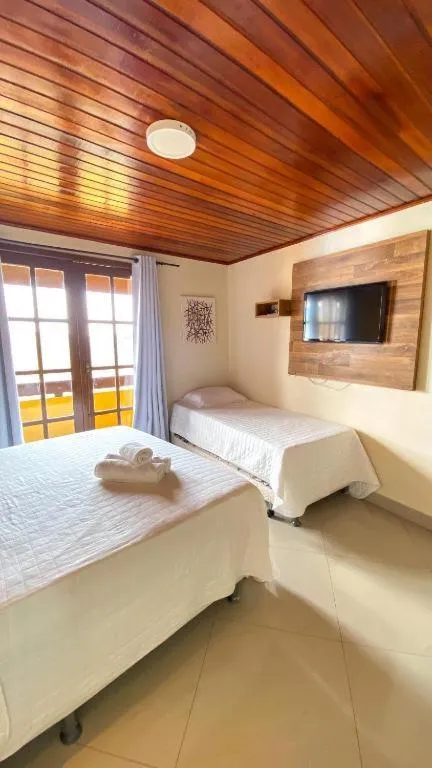 Bedroom in Pousada Dos Atobás