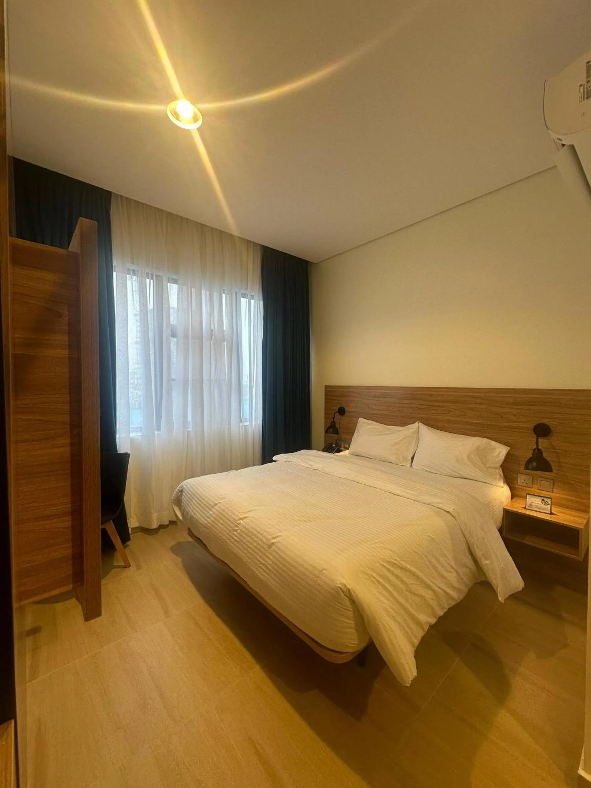 Bed in Hotelinn Oniru