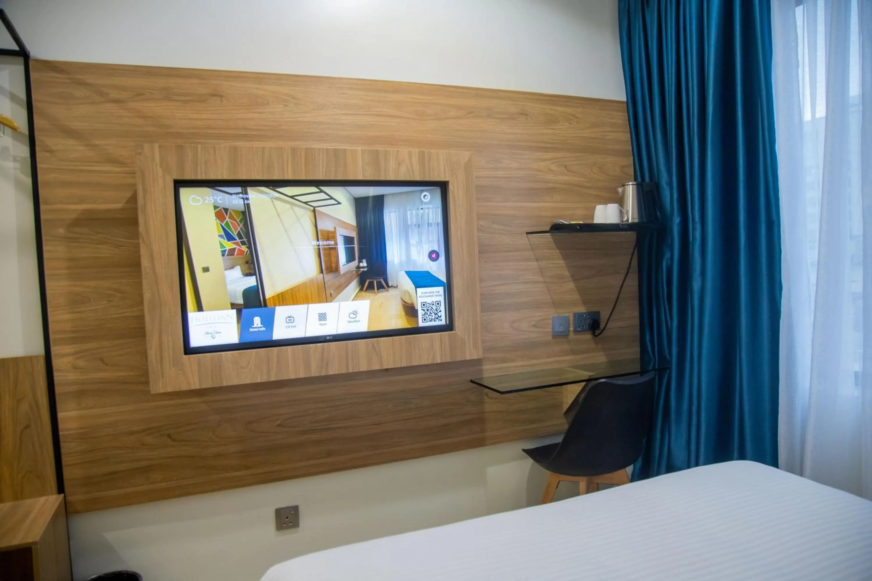 TV and multimedia in Hotelinn Oniru