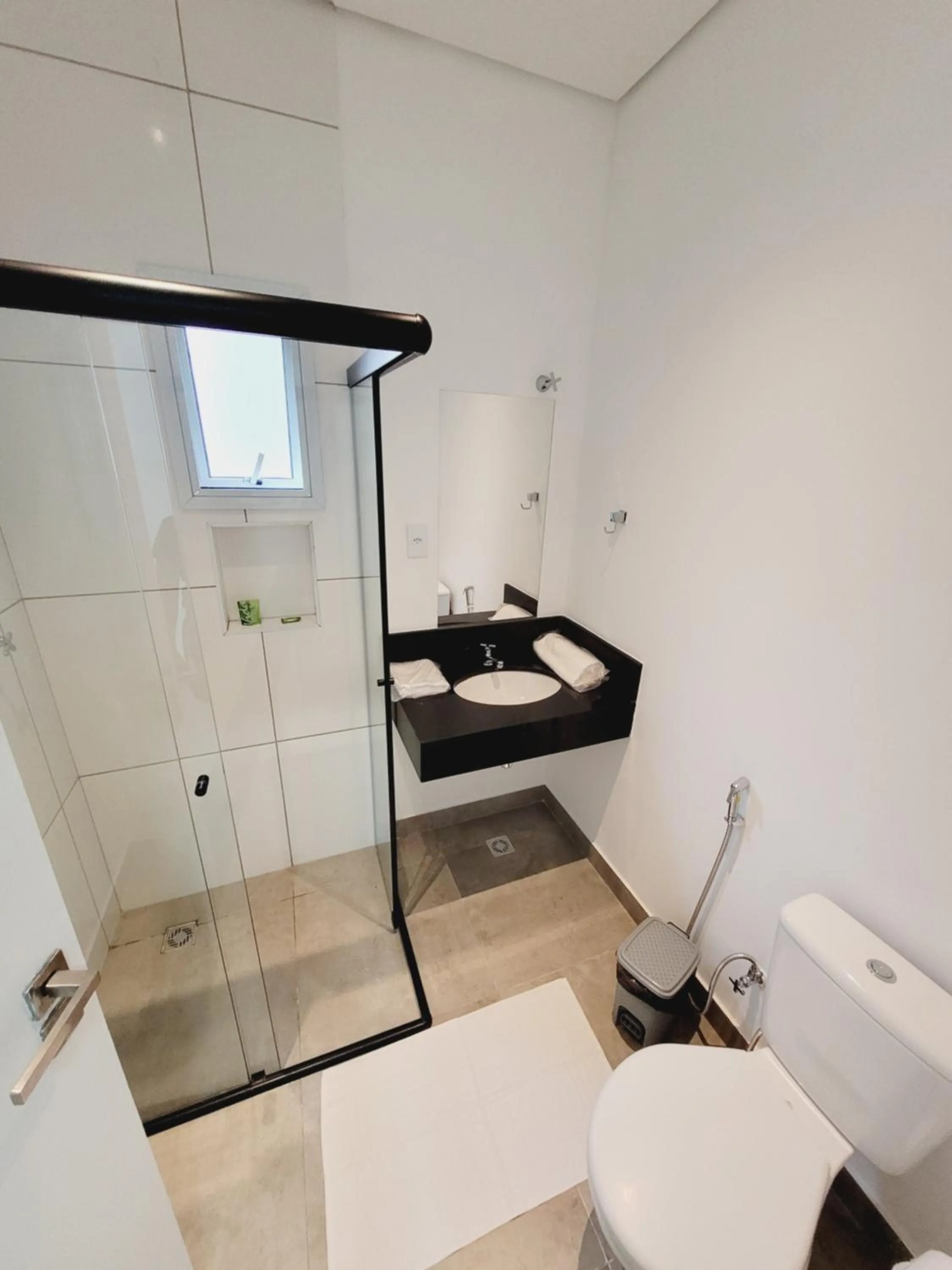 Shower in Mimos Hospedagem