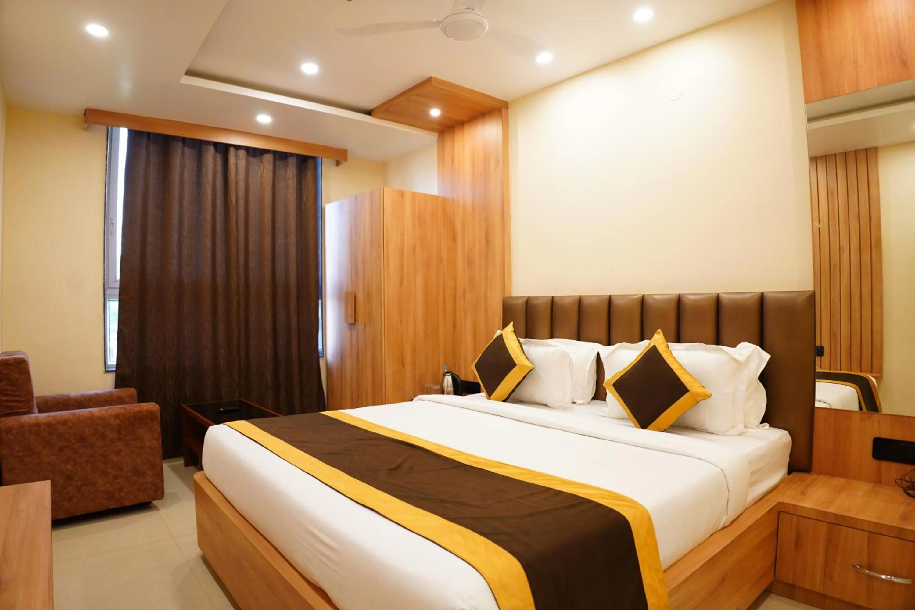 Bed in The MARUTINANDAN GRAND