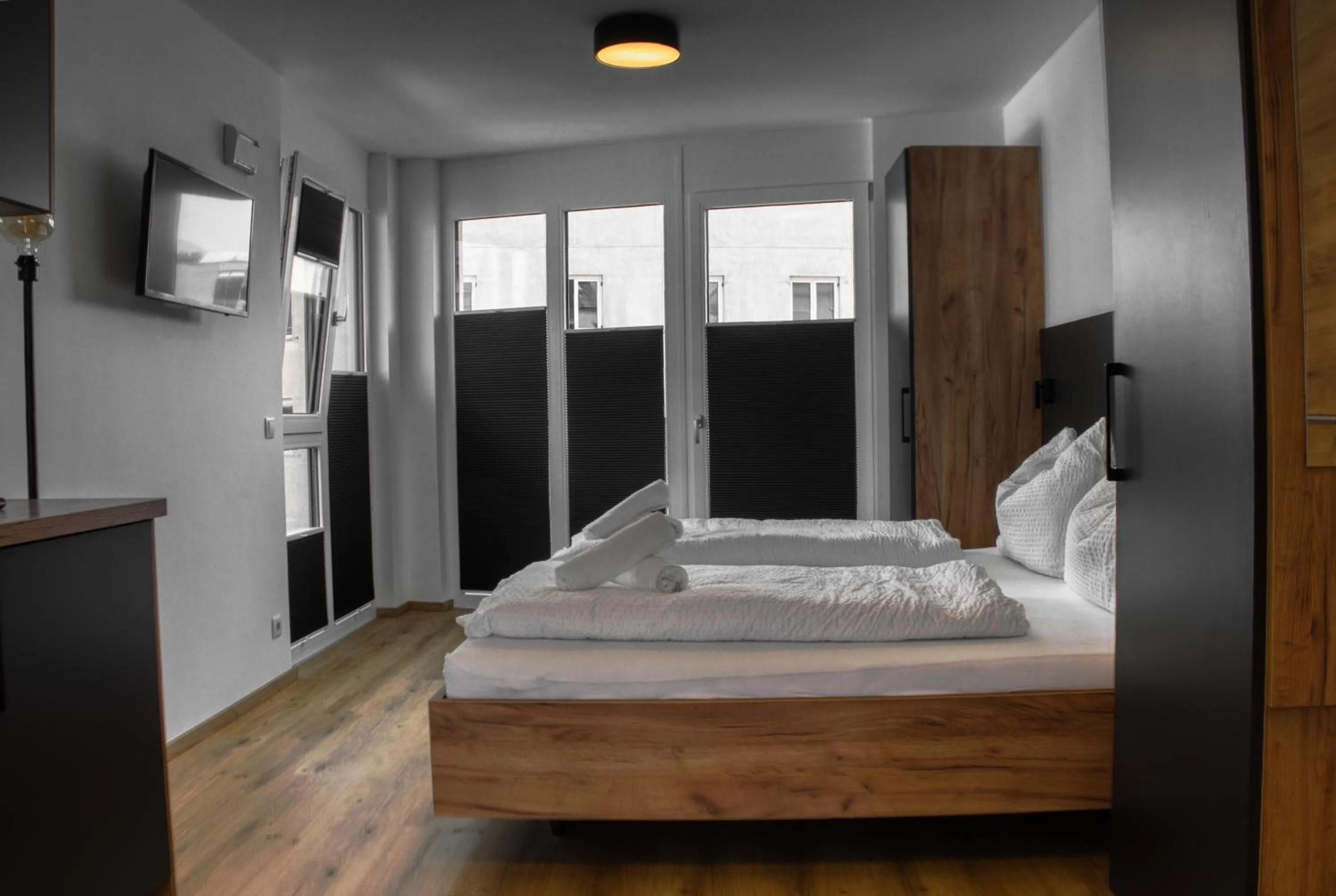 Bed in myQuartier City Chalets digital self check in