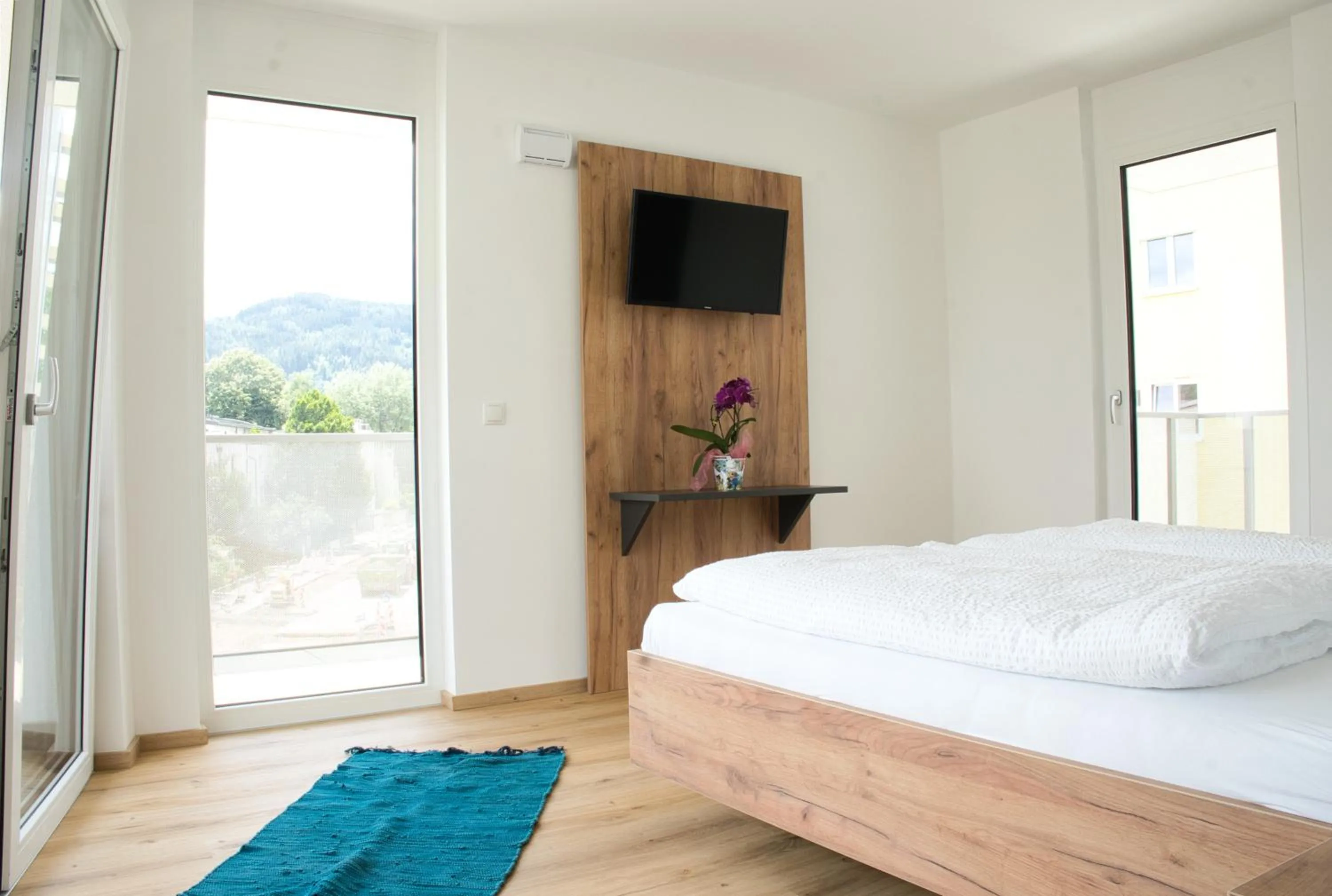 Bed in myQuartier City Chalets digital self check in