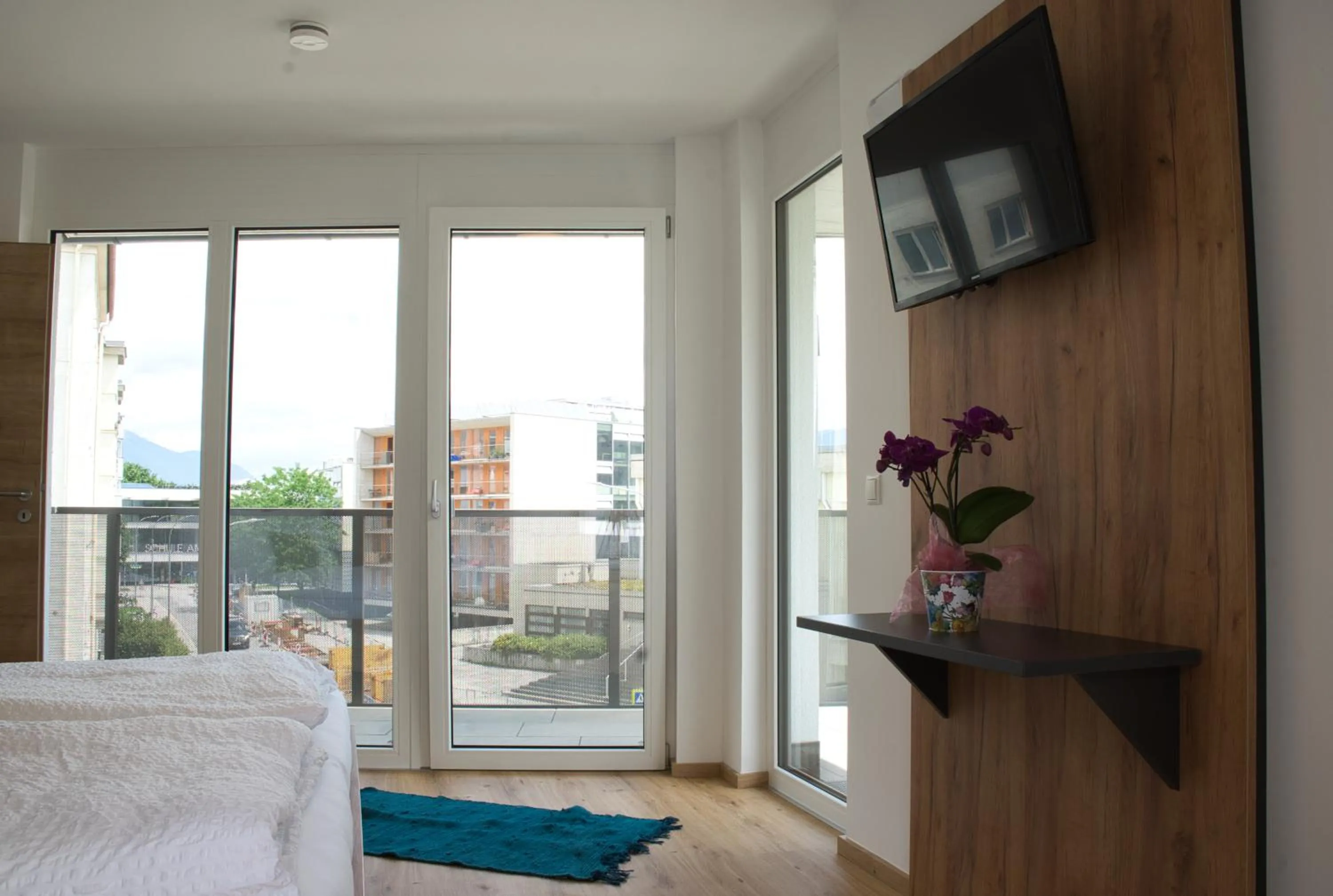 Bed in myQuartier City Chalets digital self check in