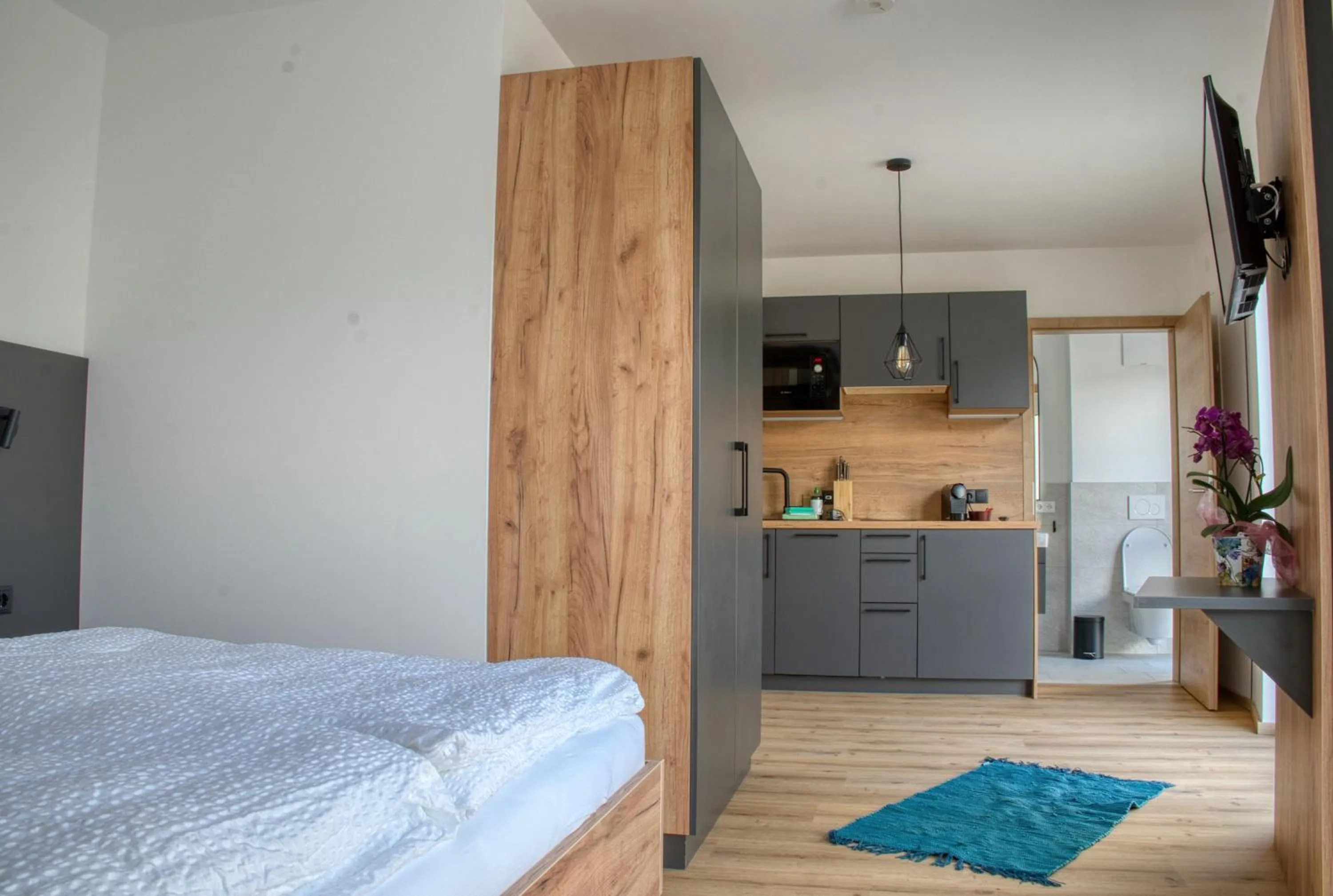 Bed in myQuartier City Chalets digital self check in