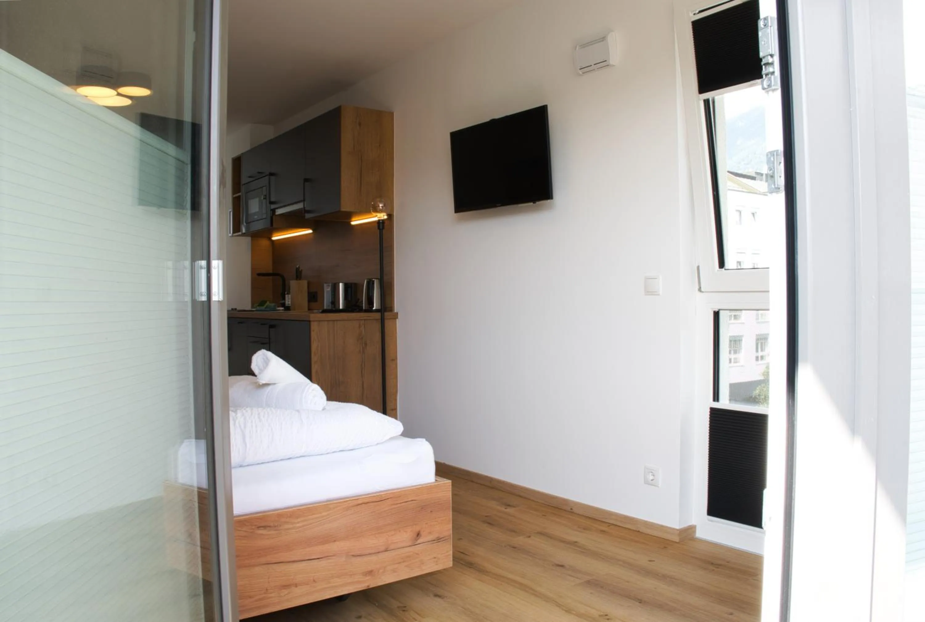 Bed in myQuartier City Chalets digital self check in