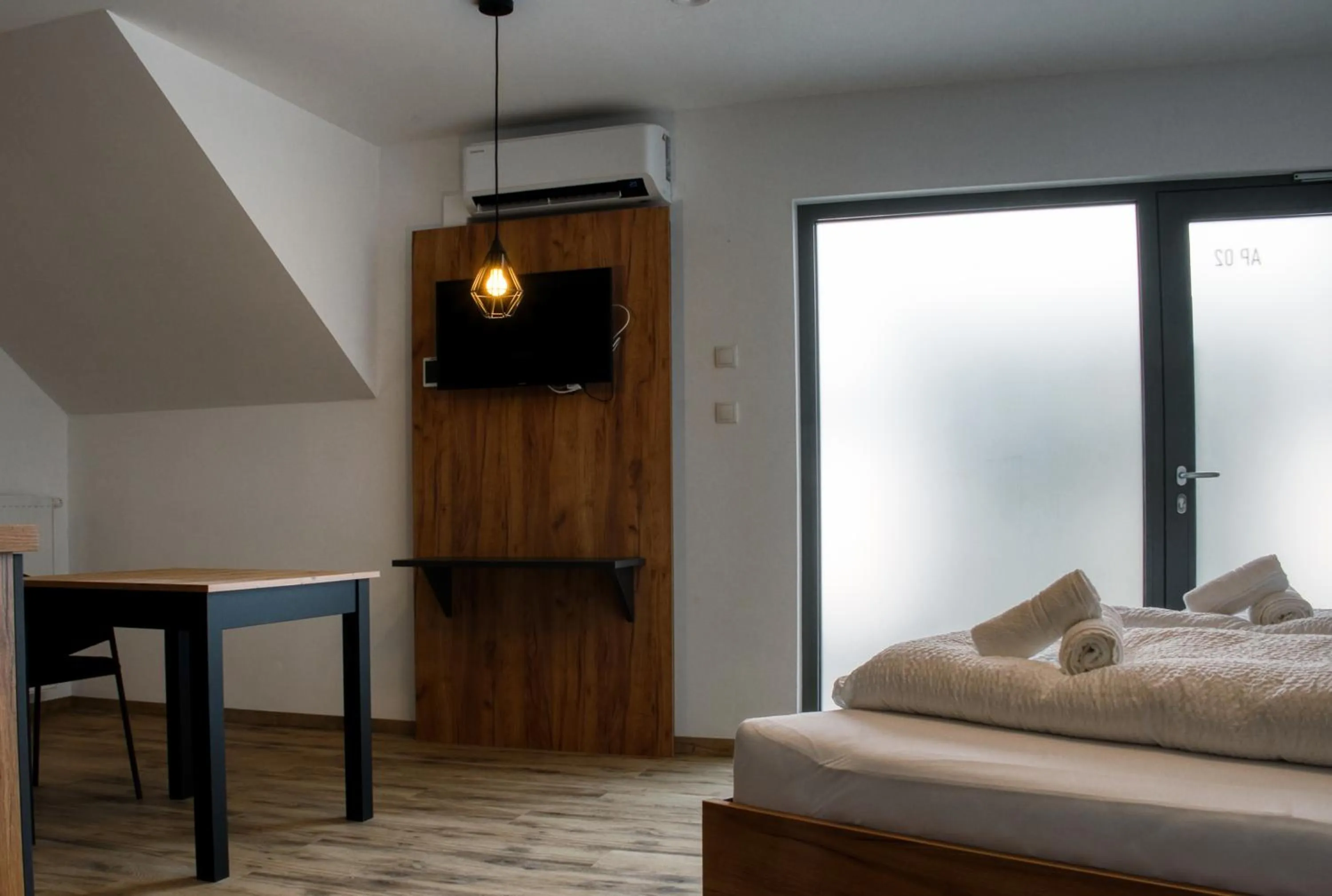 Bed in myQuartier City Chalets digital self check in