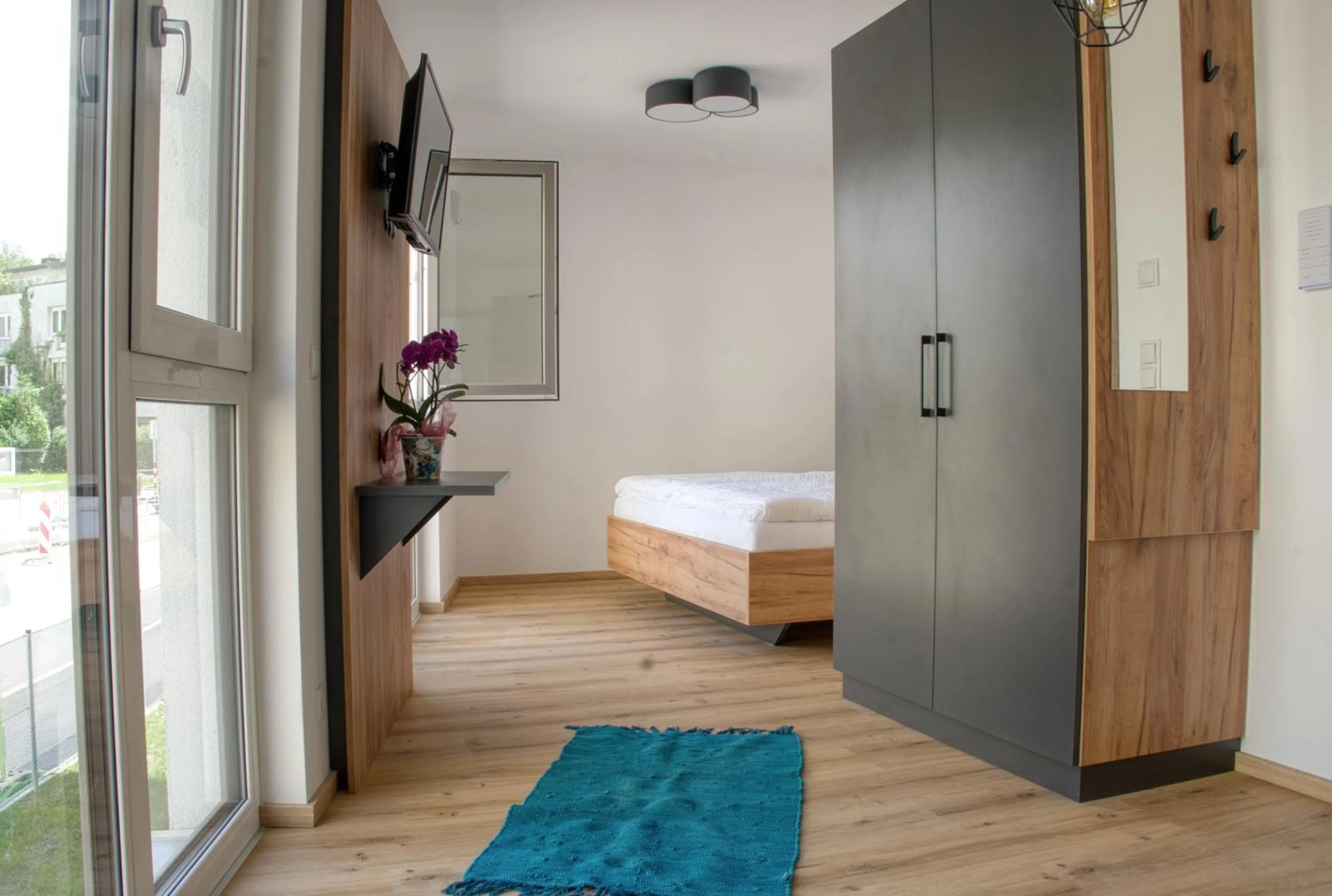 Bed in myQuartier City Chalets digital self check in