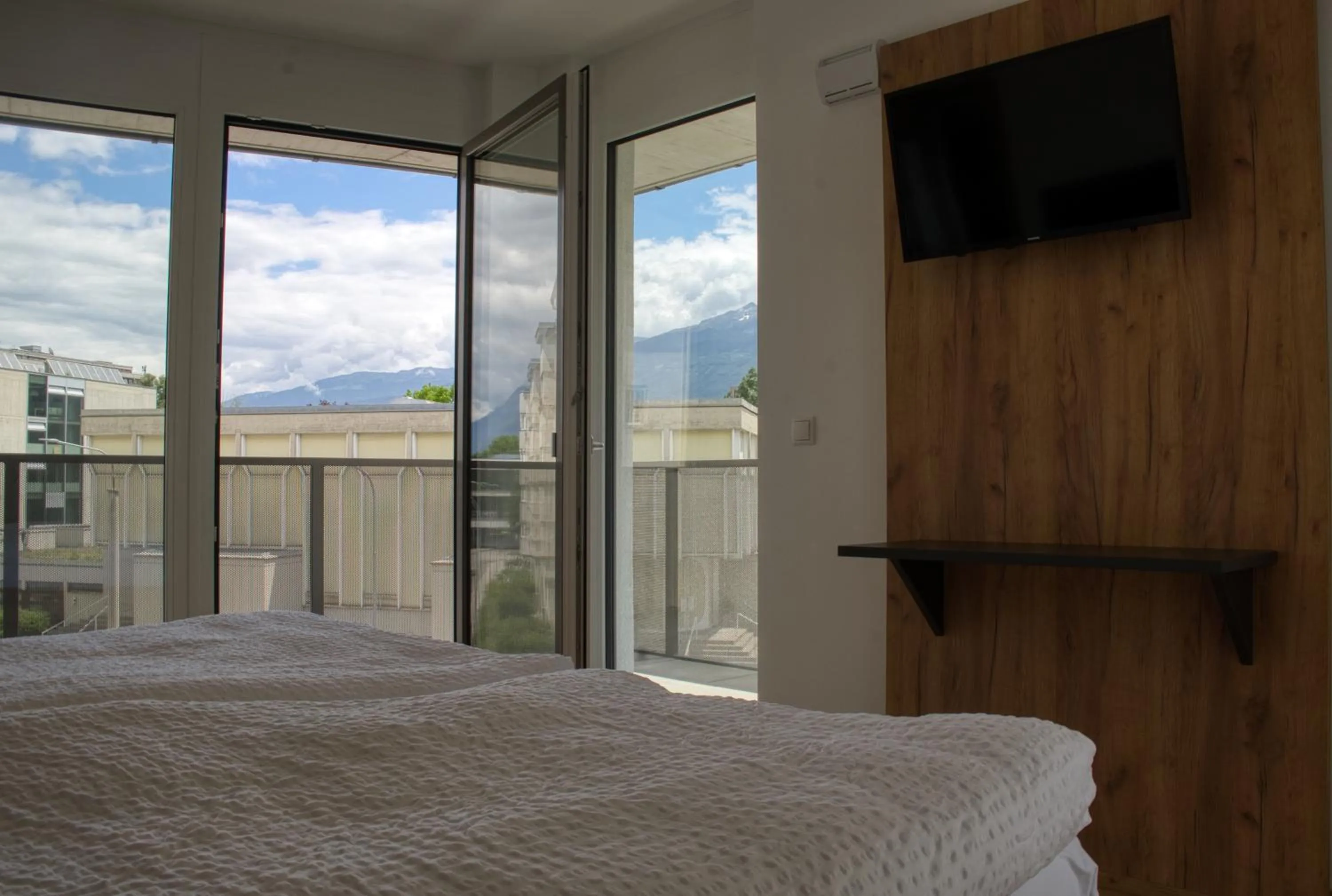 Bed in myQuartier City Chalets digital self check in