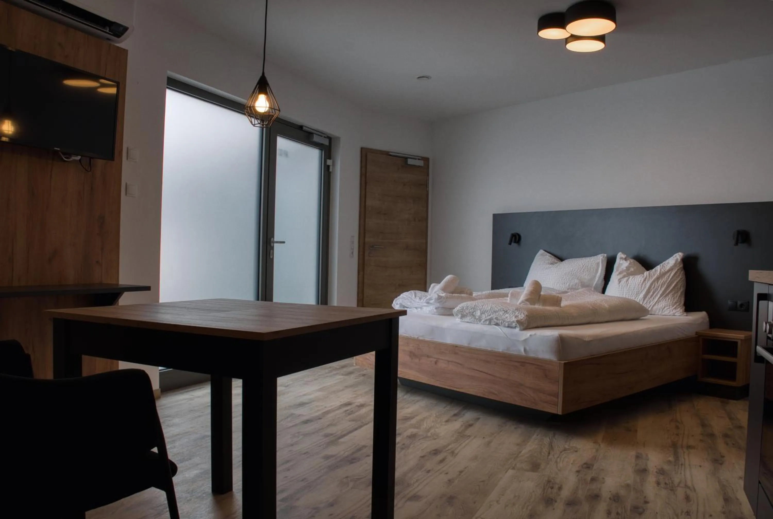 Bed in myQuartier City Chalets digital self check in