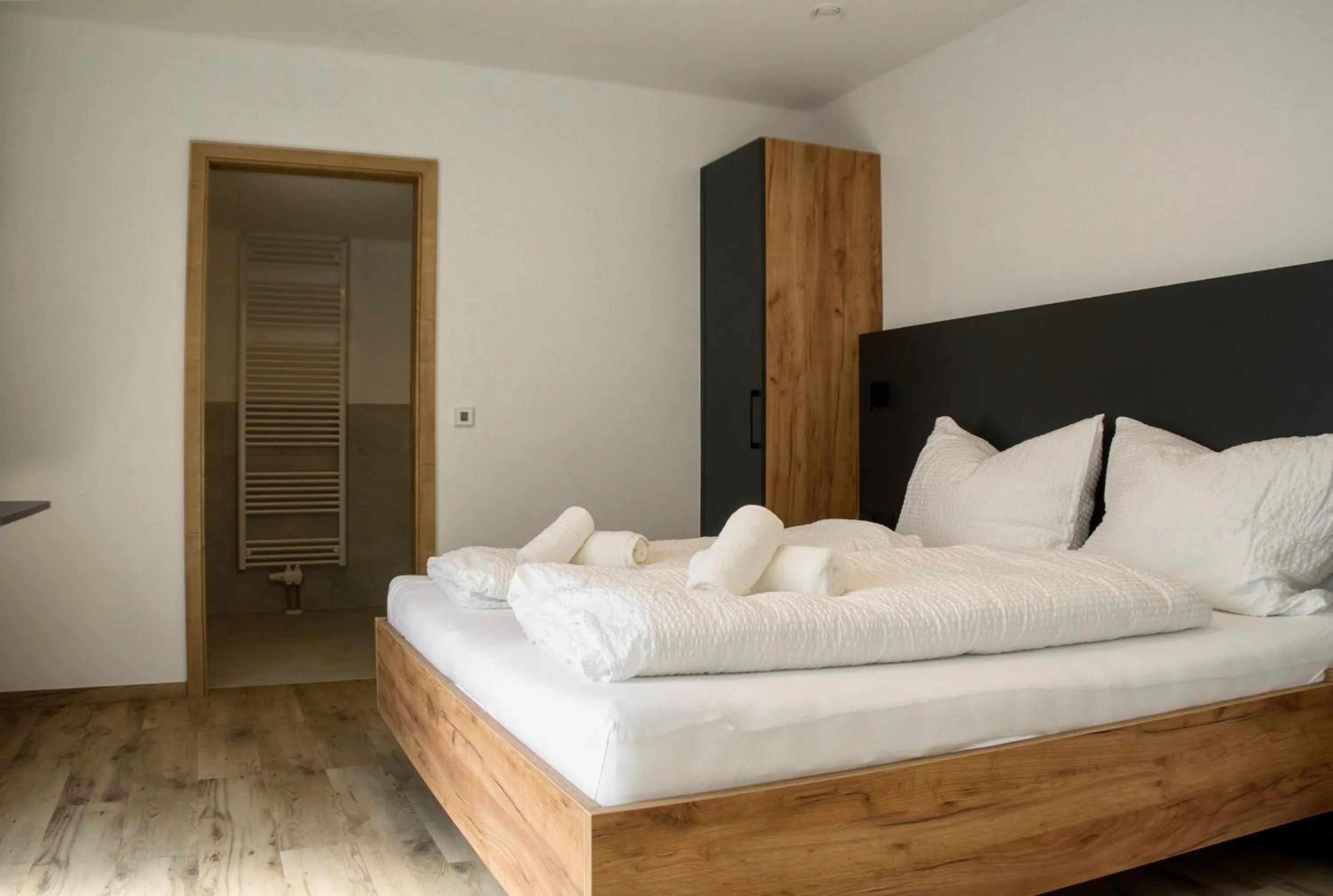 Bed in myQuartier City Chalets digital self check in