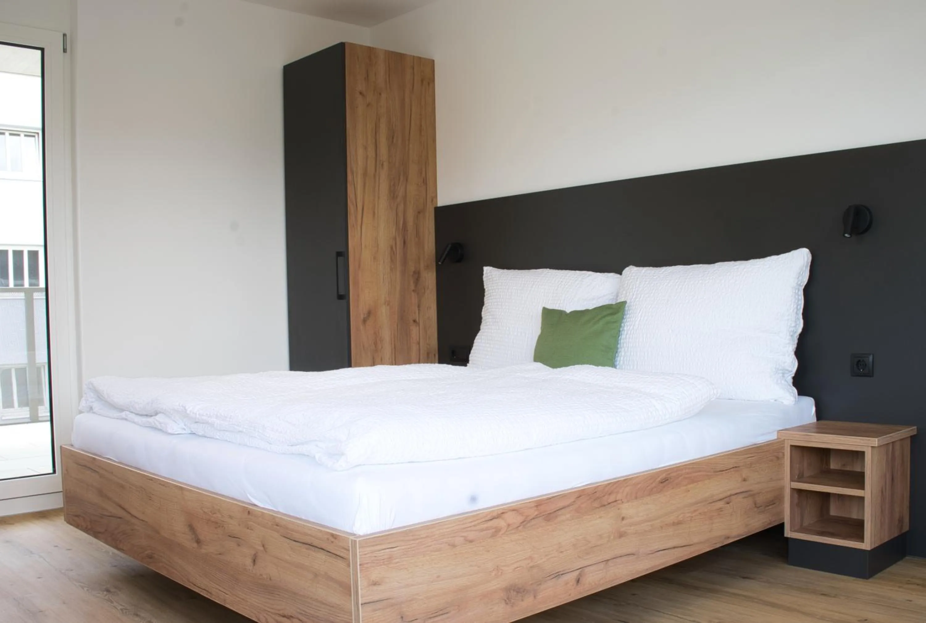 Bed in myQuartier City Chalets digital self check in