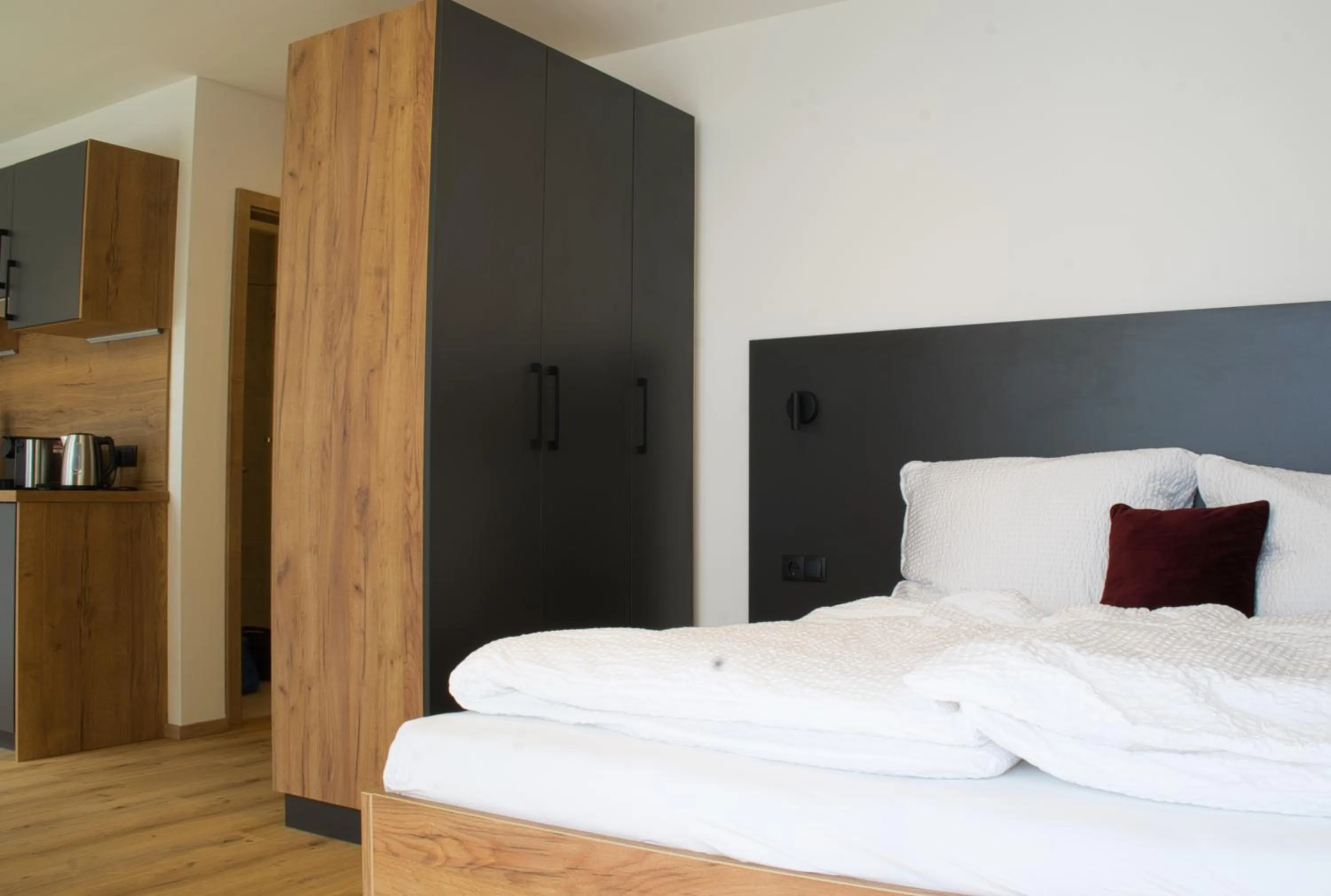 Bed in myQuartier City Chalets digital self check in