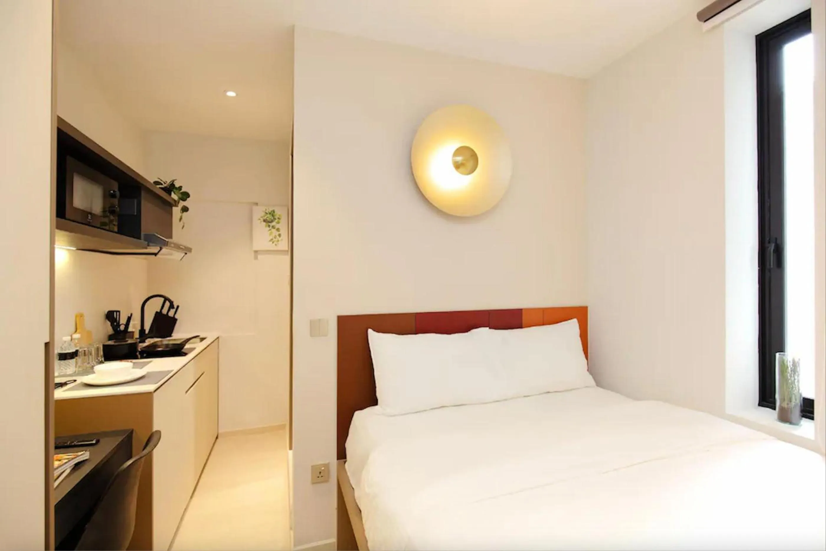 Bedroom, Bed in Habyt Studios at Novena