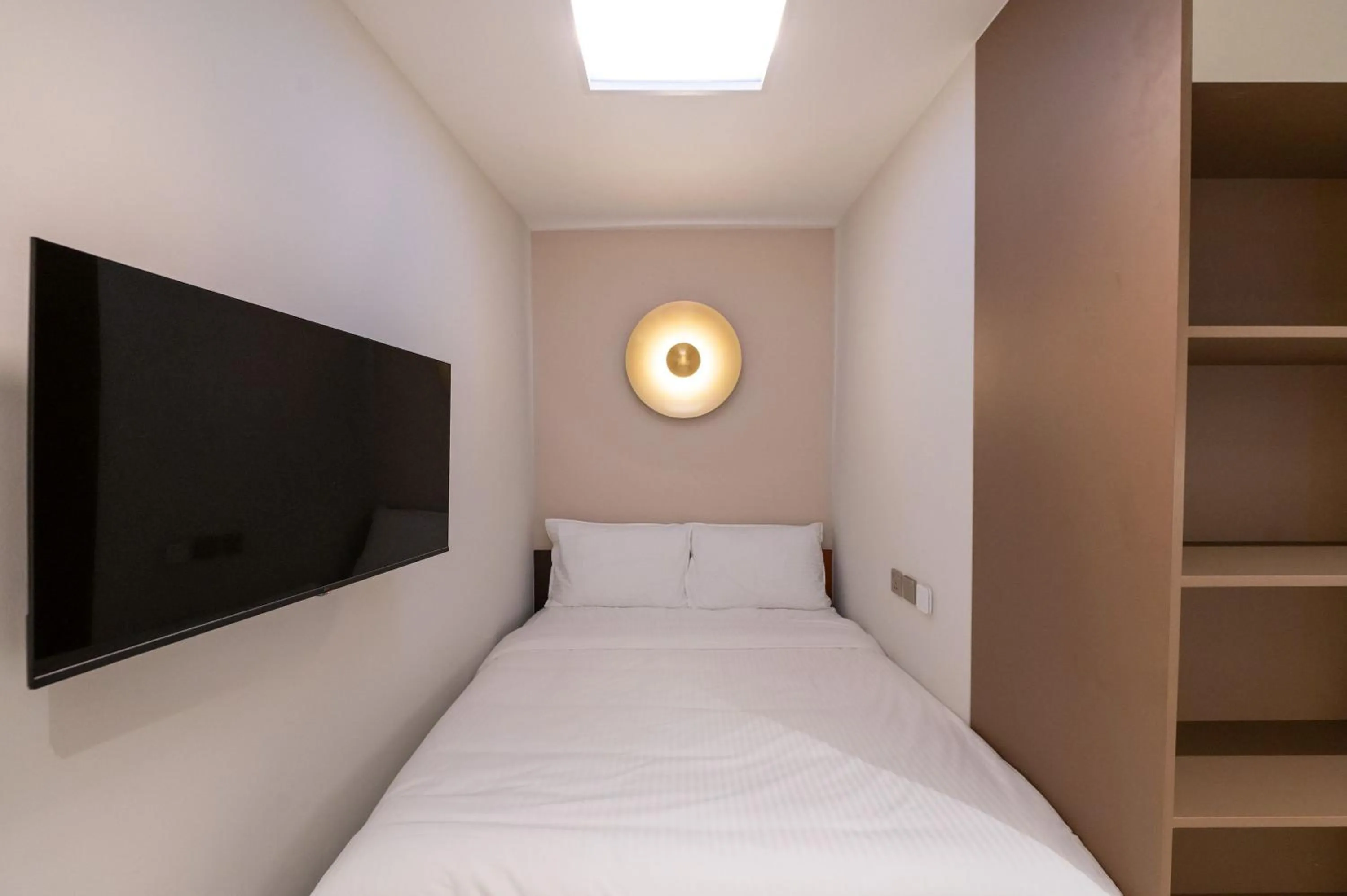 Bed in Habyt Studios at Novena