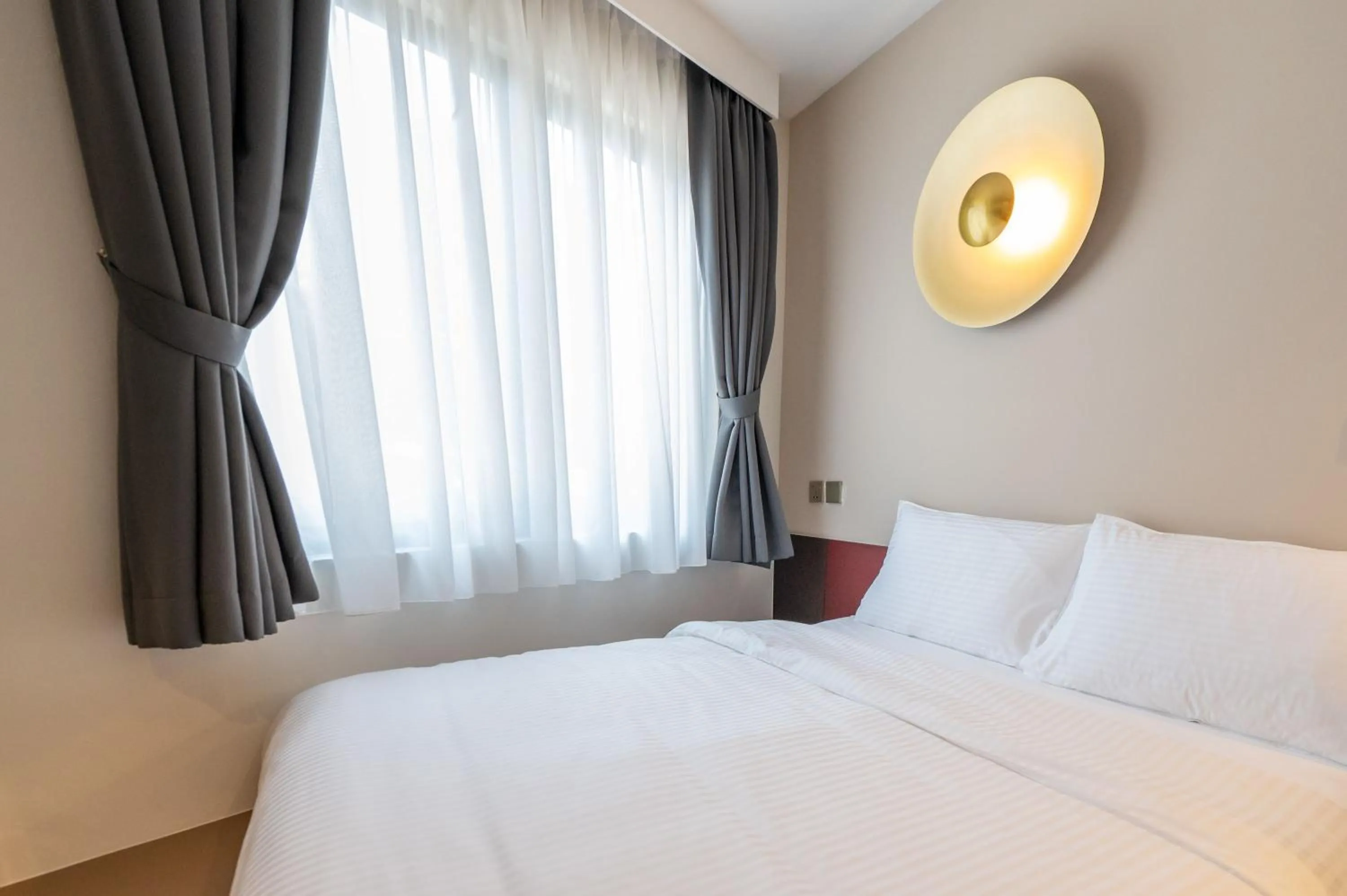 Bed in Habyt Studios at Novena