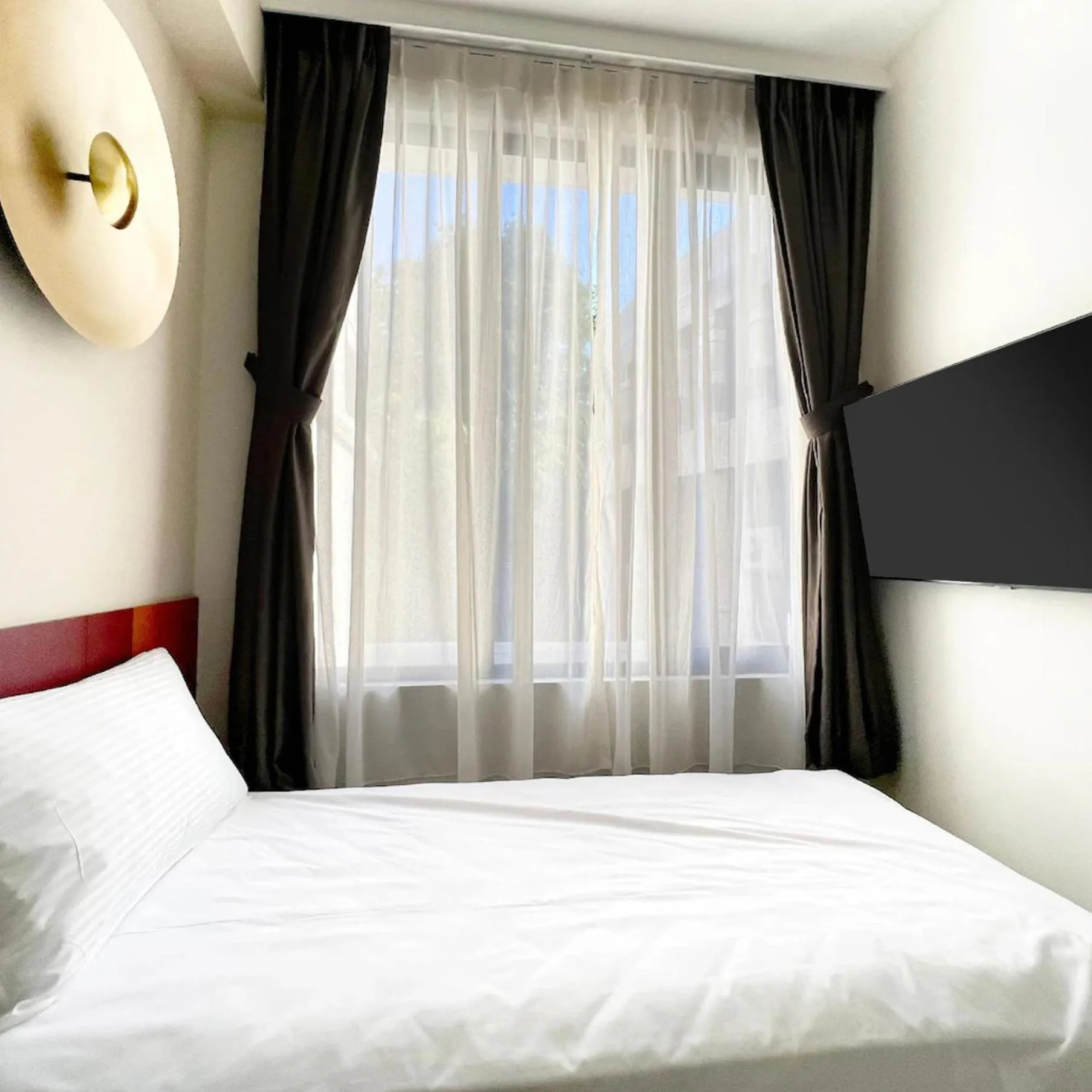 Bed in Habyt Studios at Novena