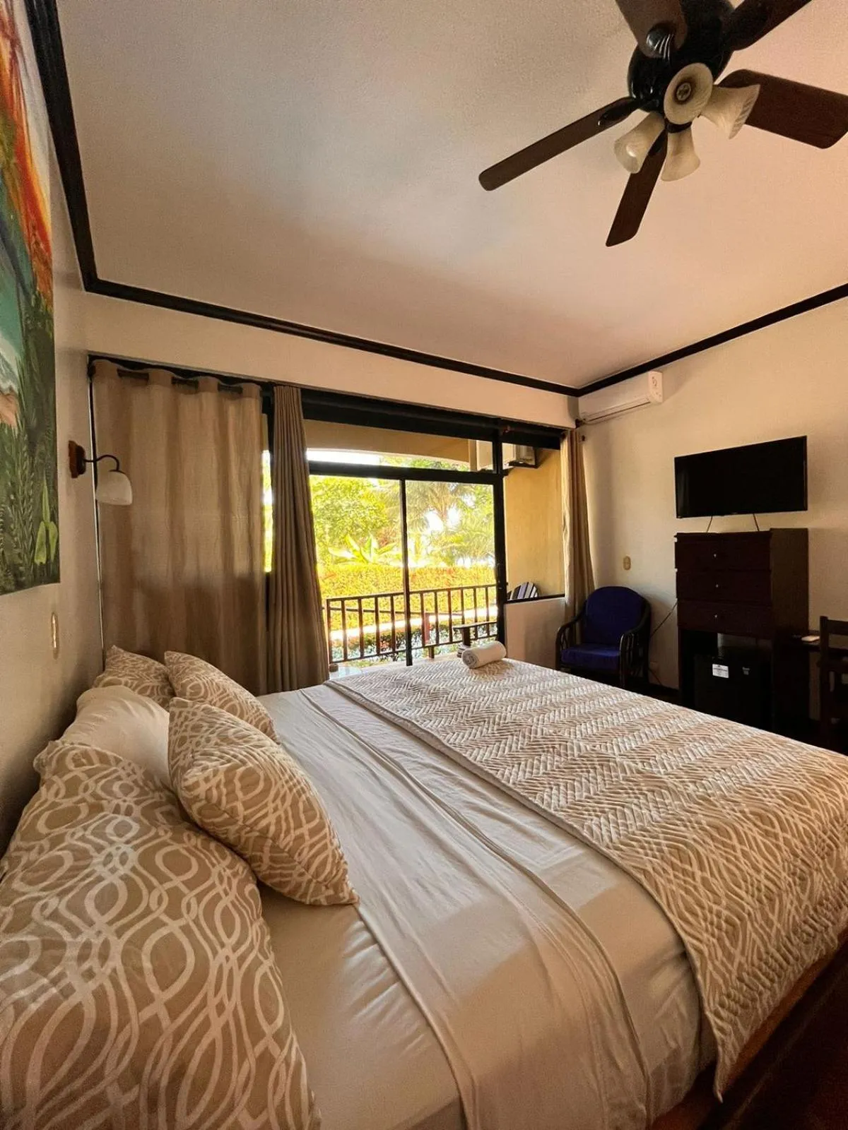 Bedroom, Bed in The Backyard Beachfront Hotel