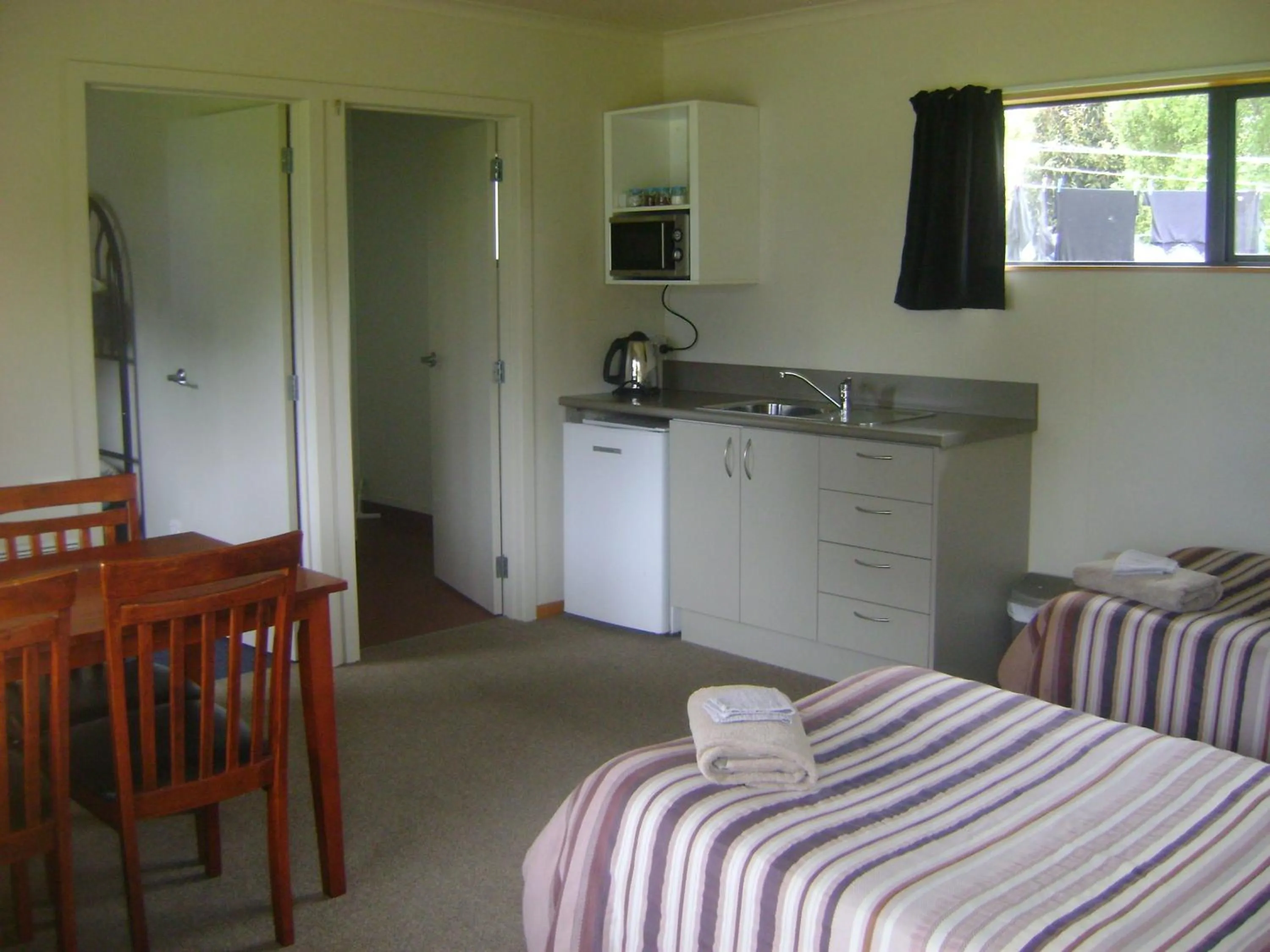Kitchen or kitchenette in Catlins Newhaven Holiday Park