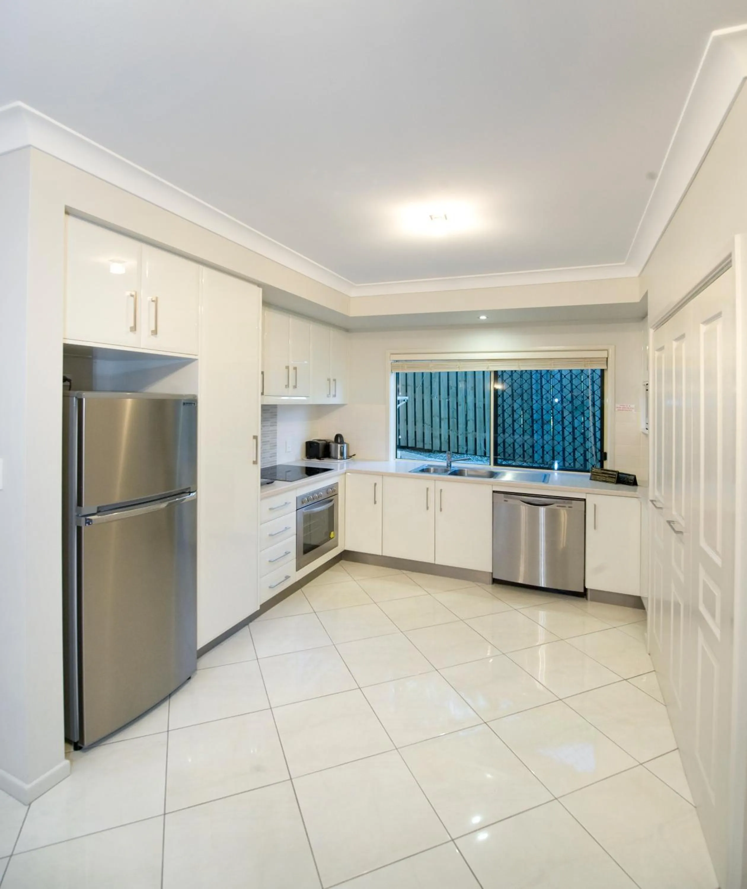 Kitchen or kitchenette in Apartments on Palmer