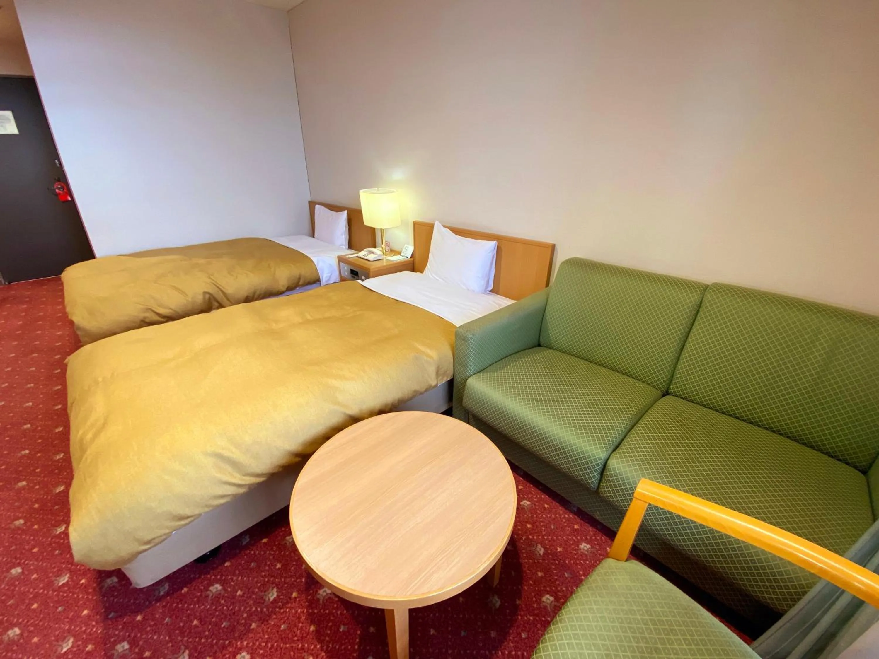 Bed in Hotel Lavenir