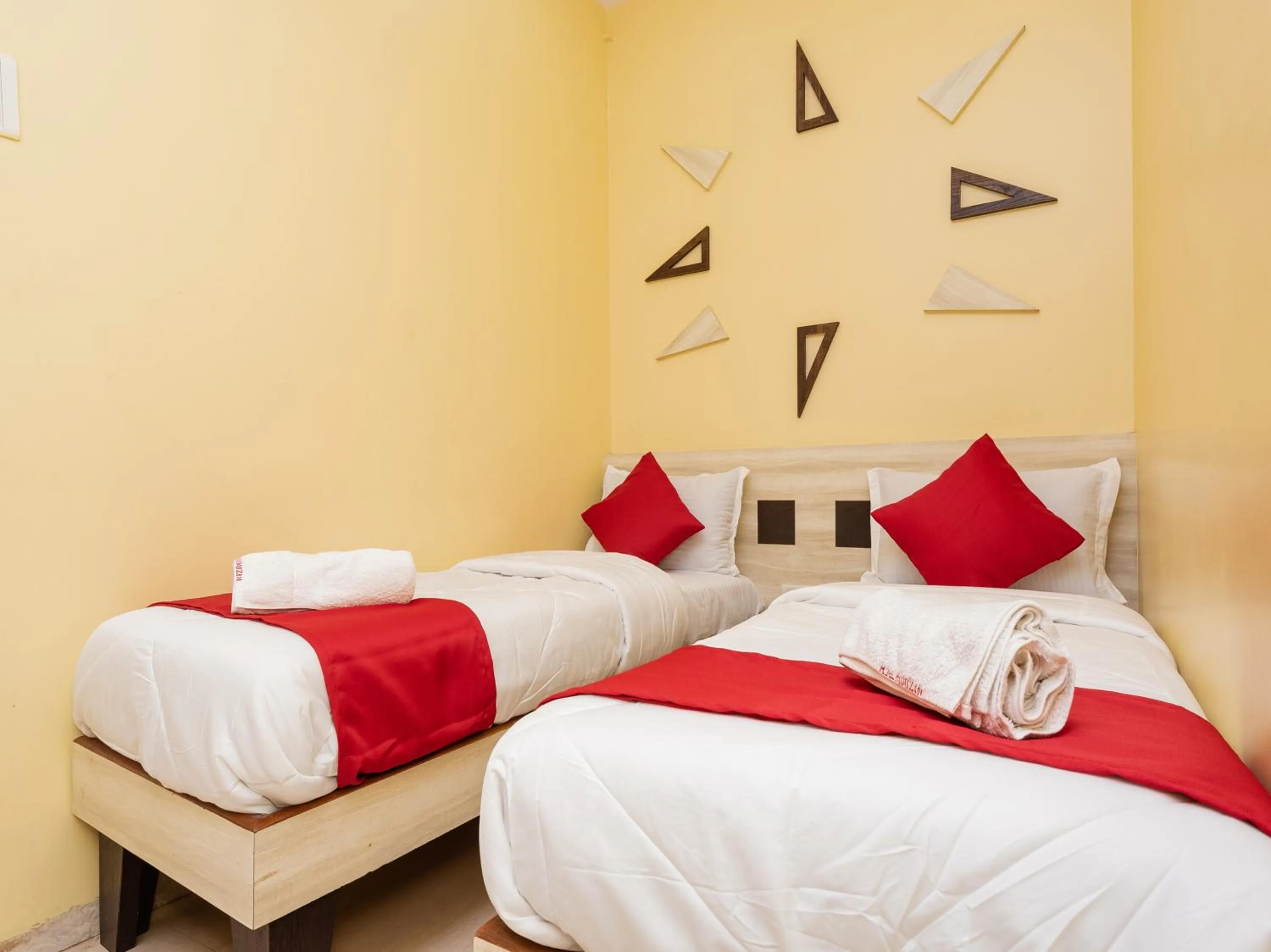 Bed in Hotel Al Moazin