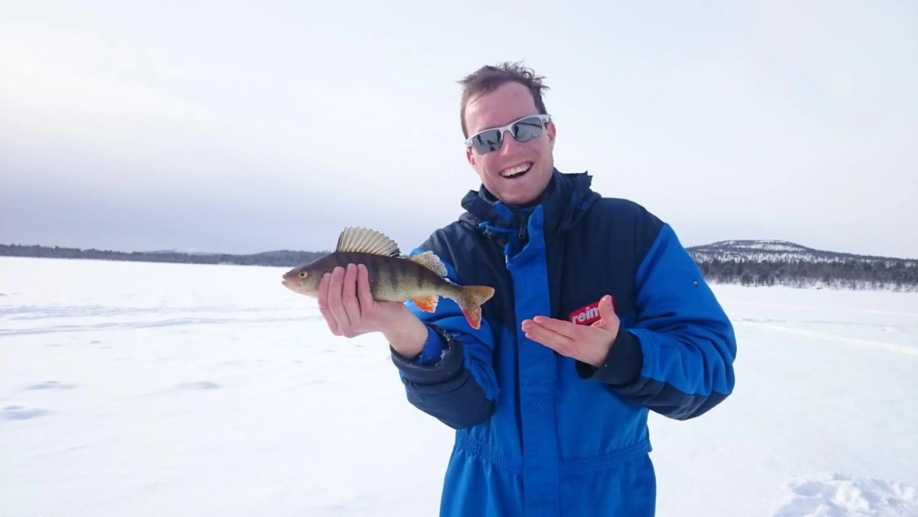 Fishing in Lake Inari Mobile Cabins