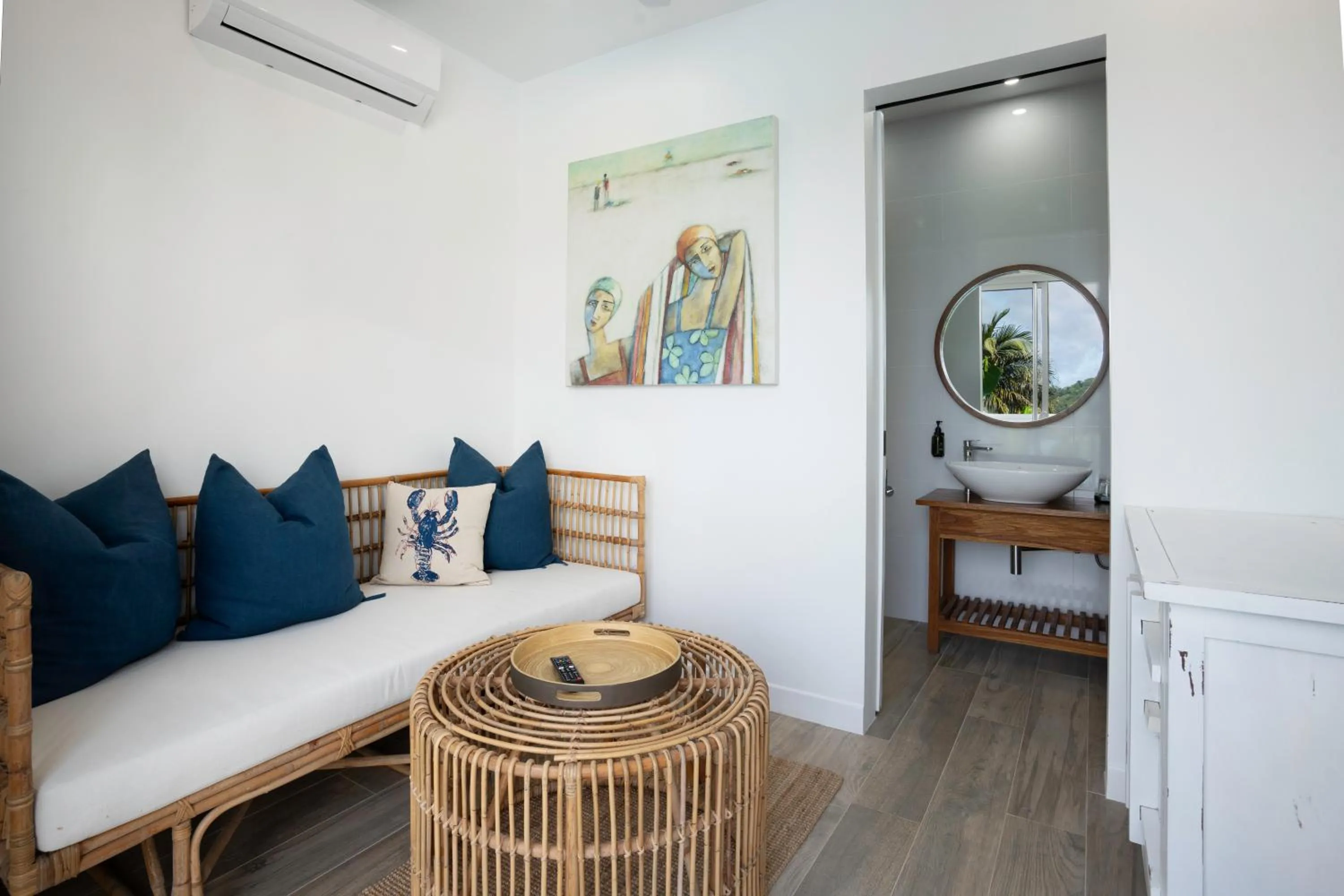 Seating area, Bed in The Bay Seychelles Boutique Hotel and Apartments