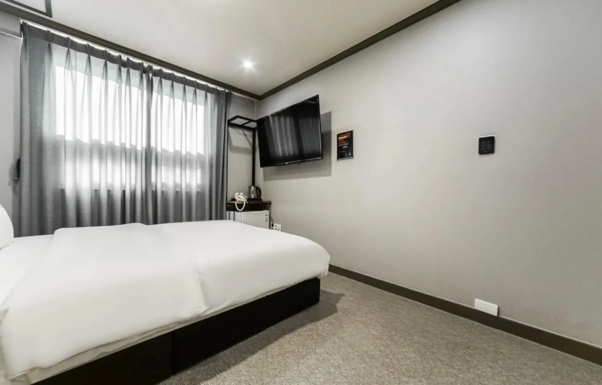 Bed in The Sharp Hotel