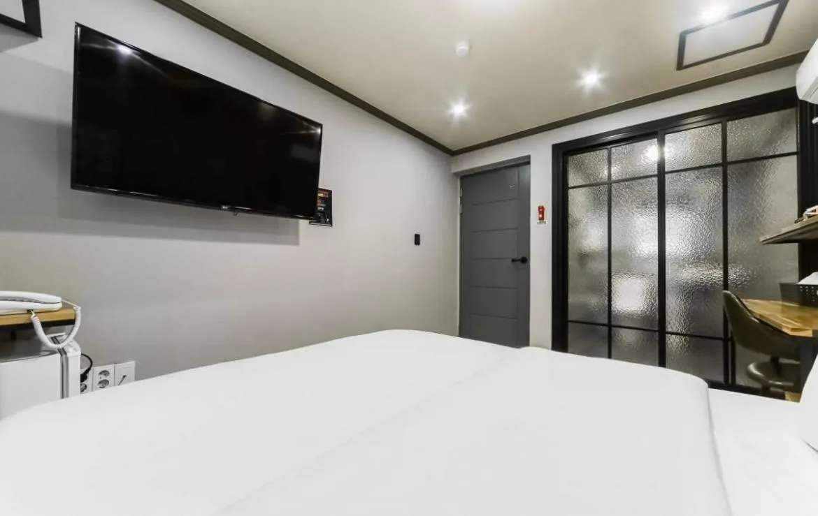 Bed in The Sharp Hotel