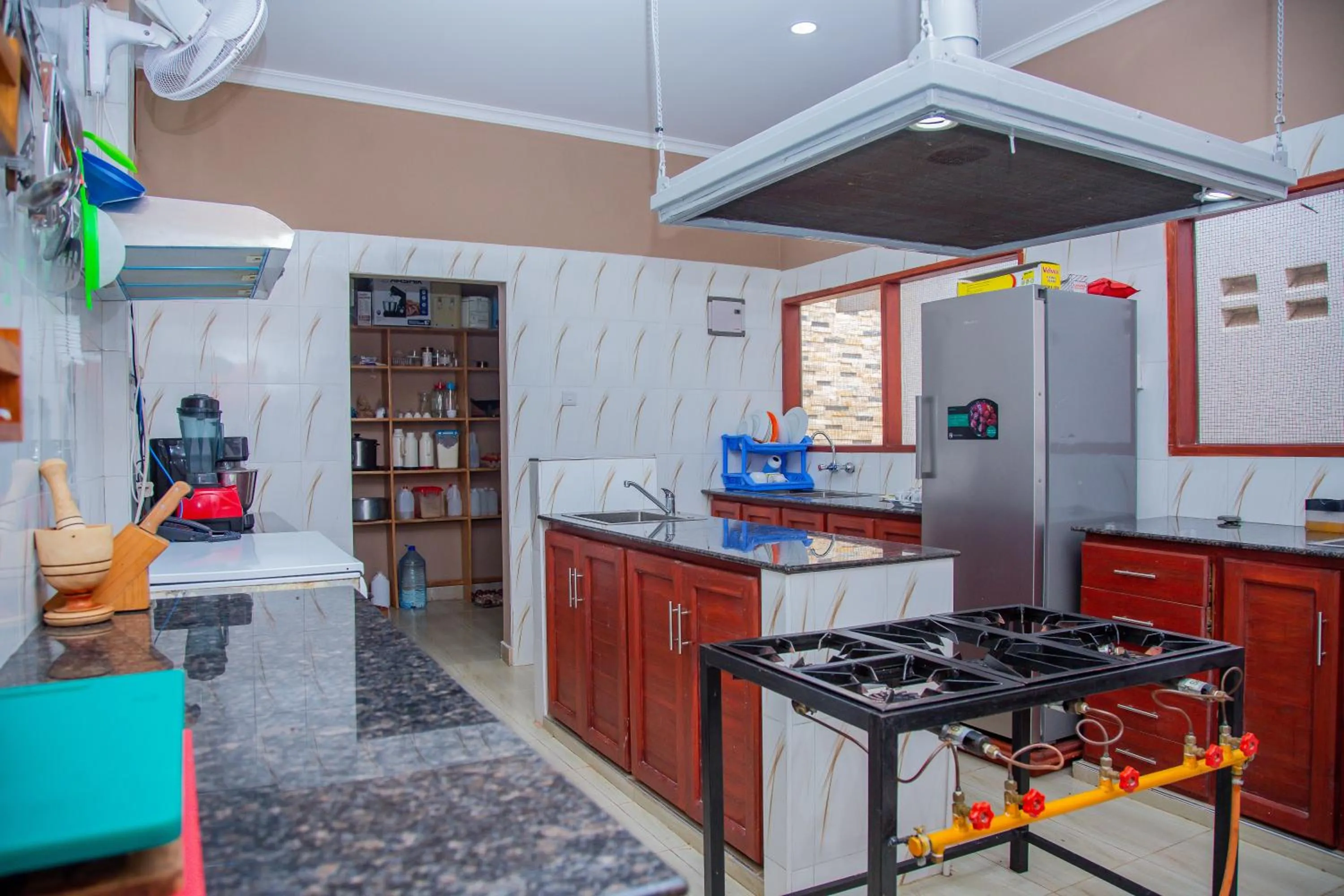 Kitchen or kitchenette in La Casa Preciosa in Tanga