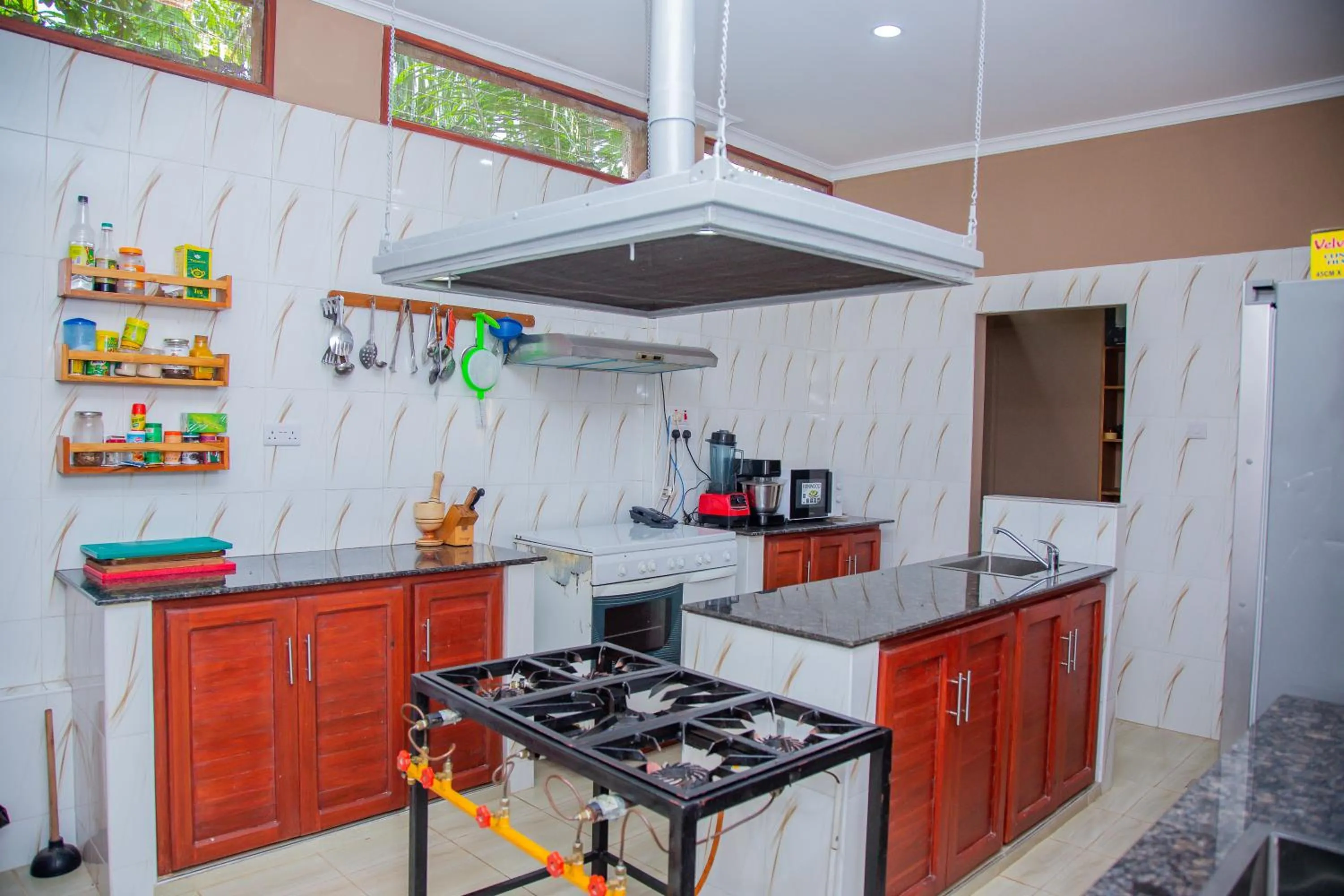 Kitchen or kitchenette in La Casa Preciosa in Tanga