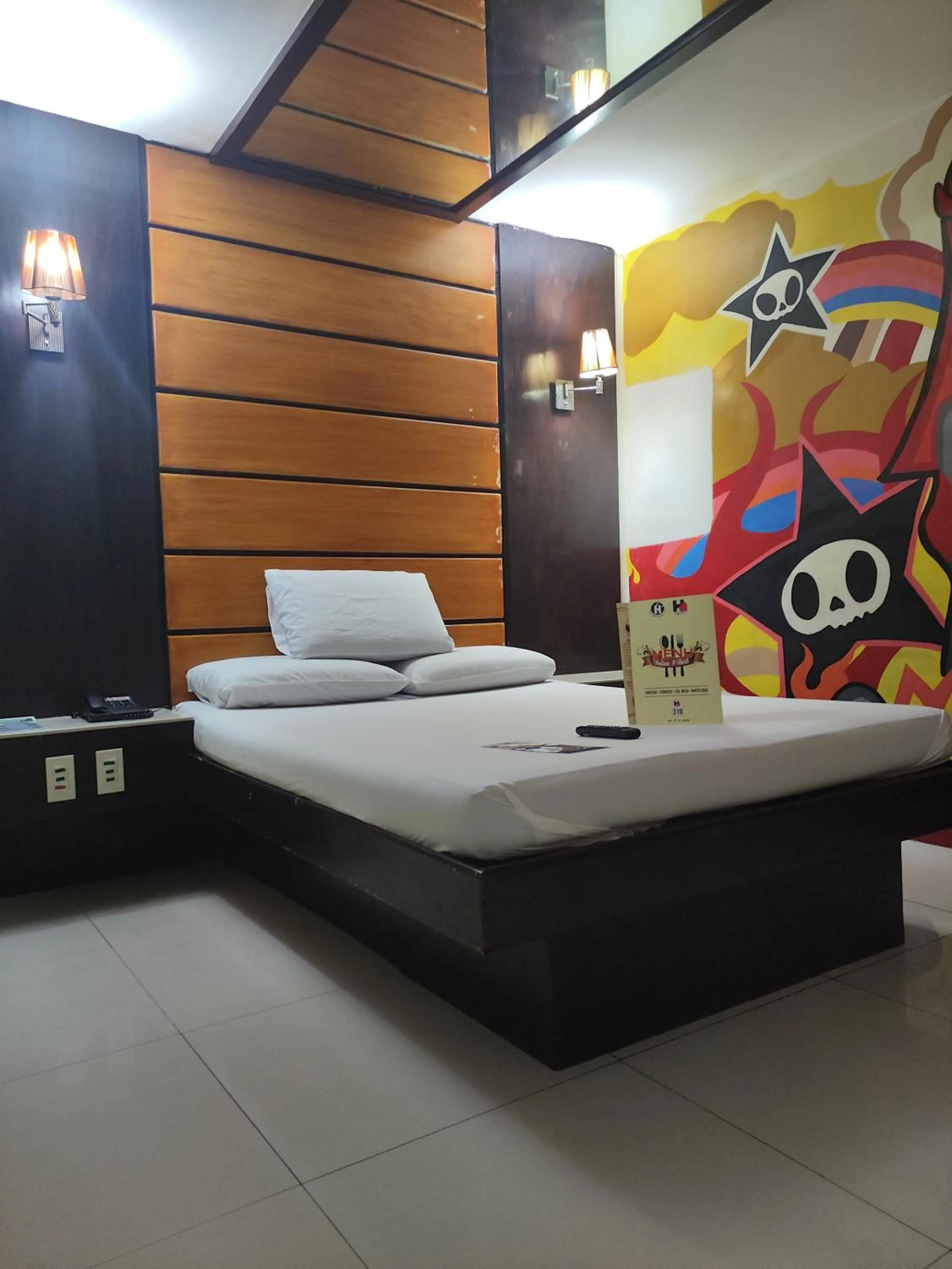 Bed in Harts Hotel-Quezon City