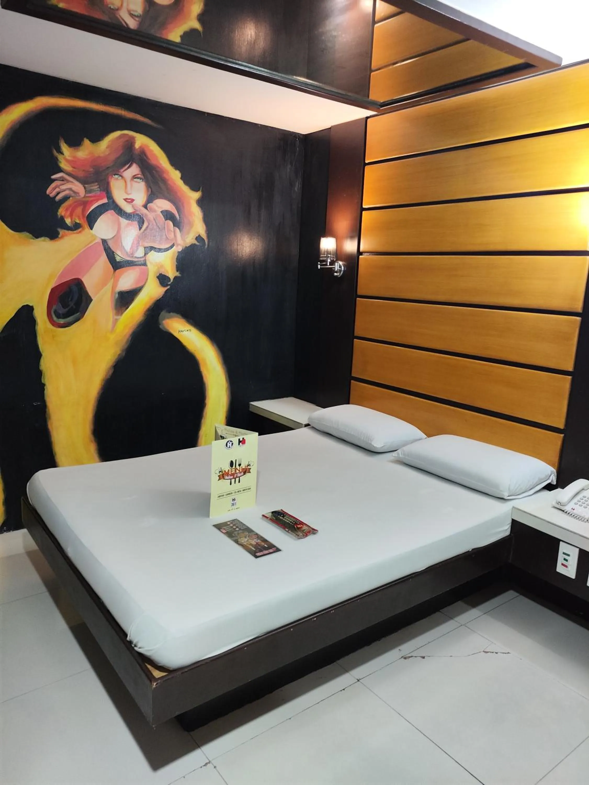 Bed in Harts Hotel-Quezon City