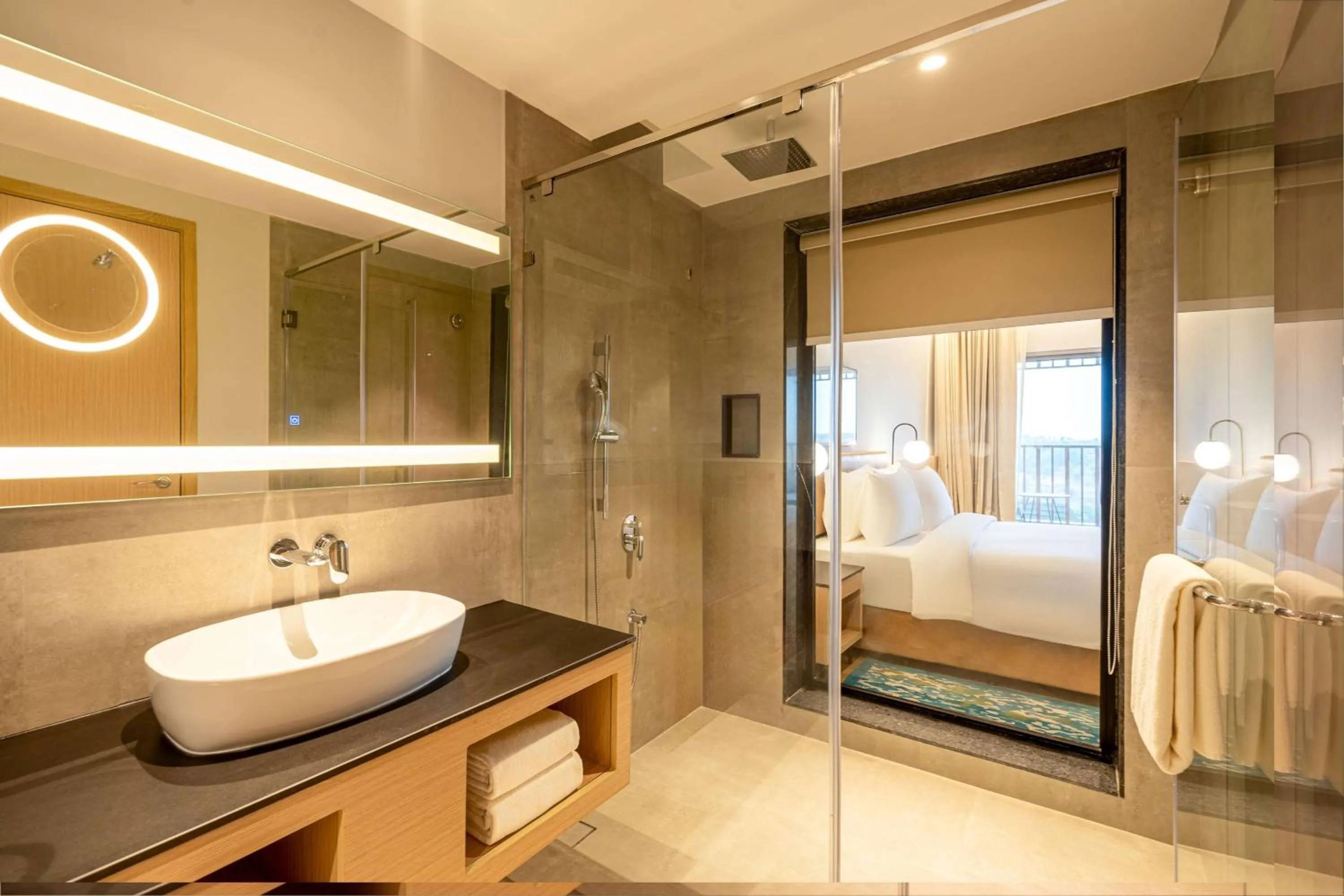 Bathroom, Bed in Radisson Resort Hatgad Saputara